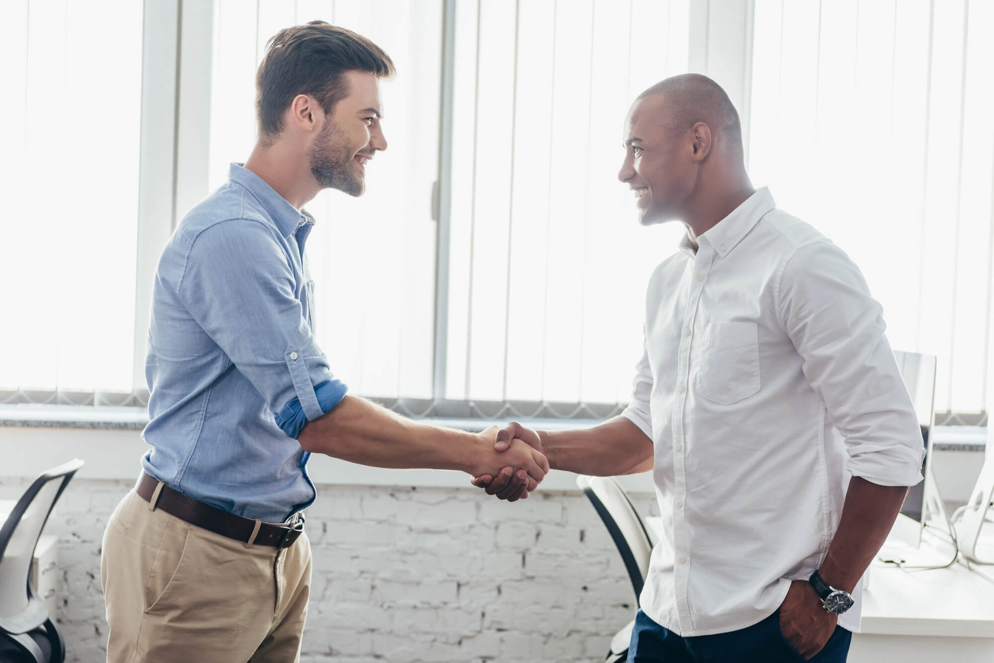 two business owners shaking hands