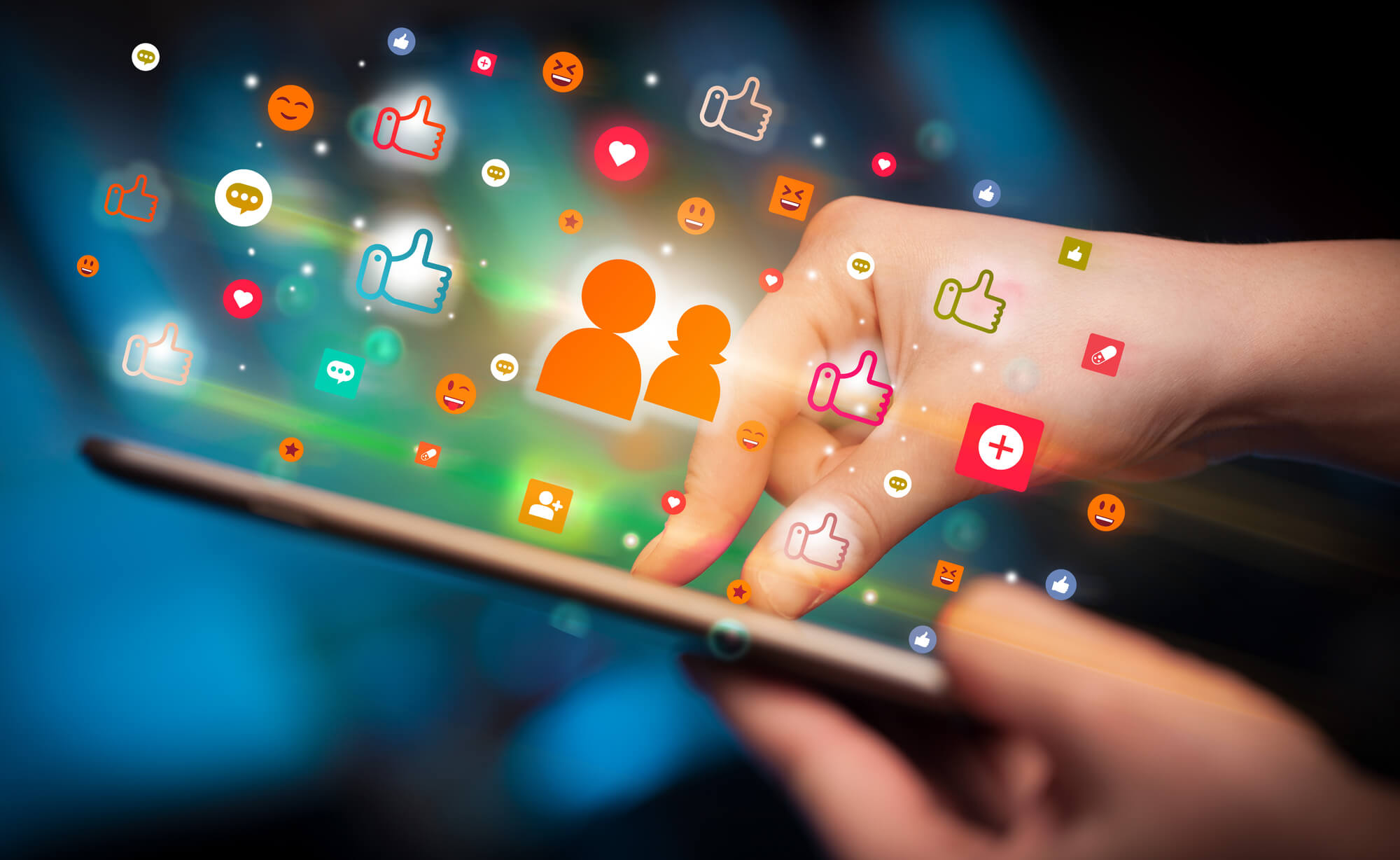 person using tablet to interact on social media