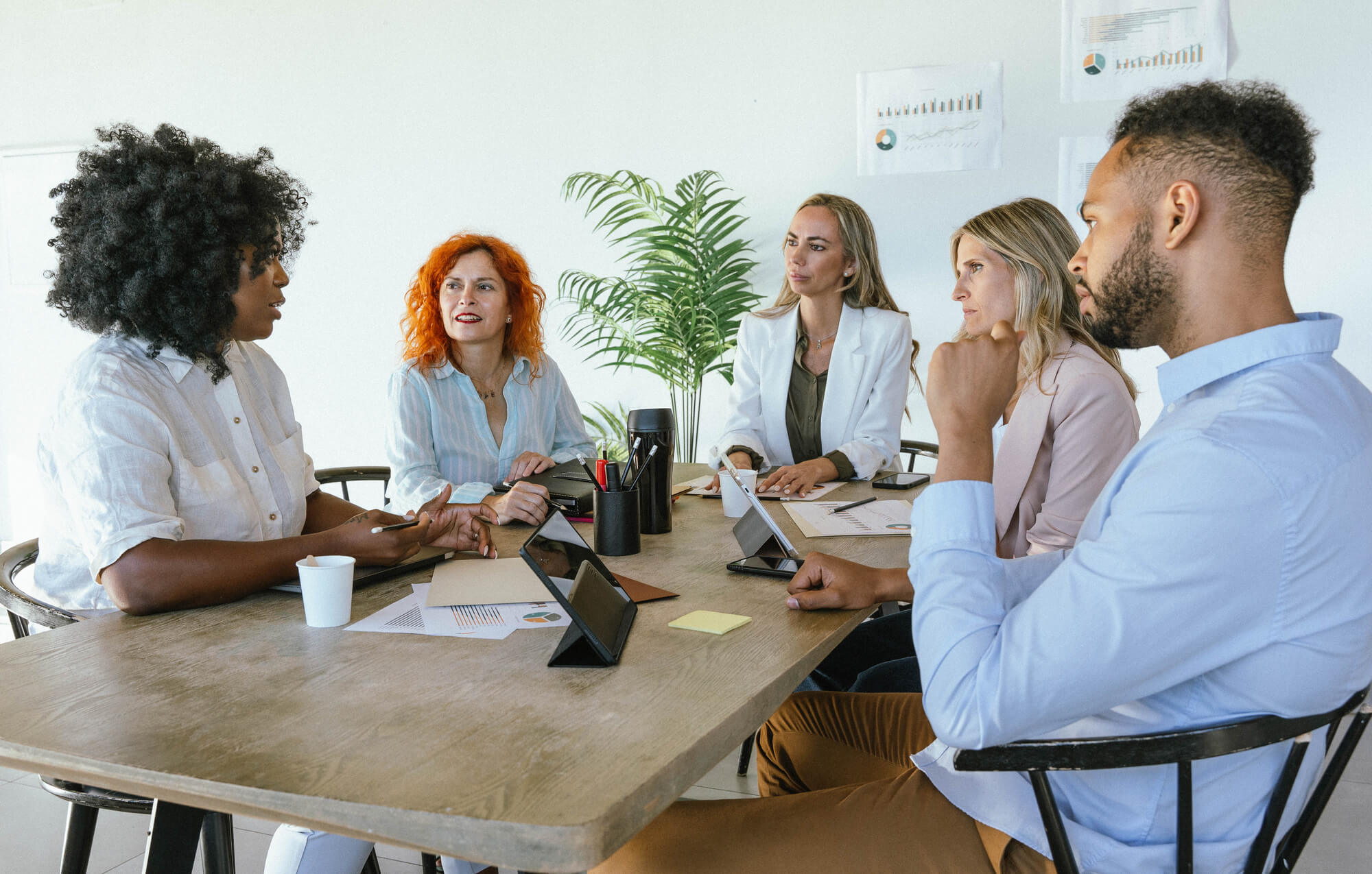 team members exchanging ideas during a meeting