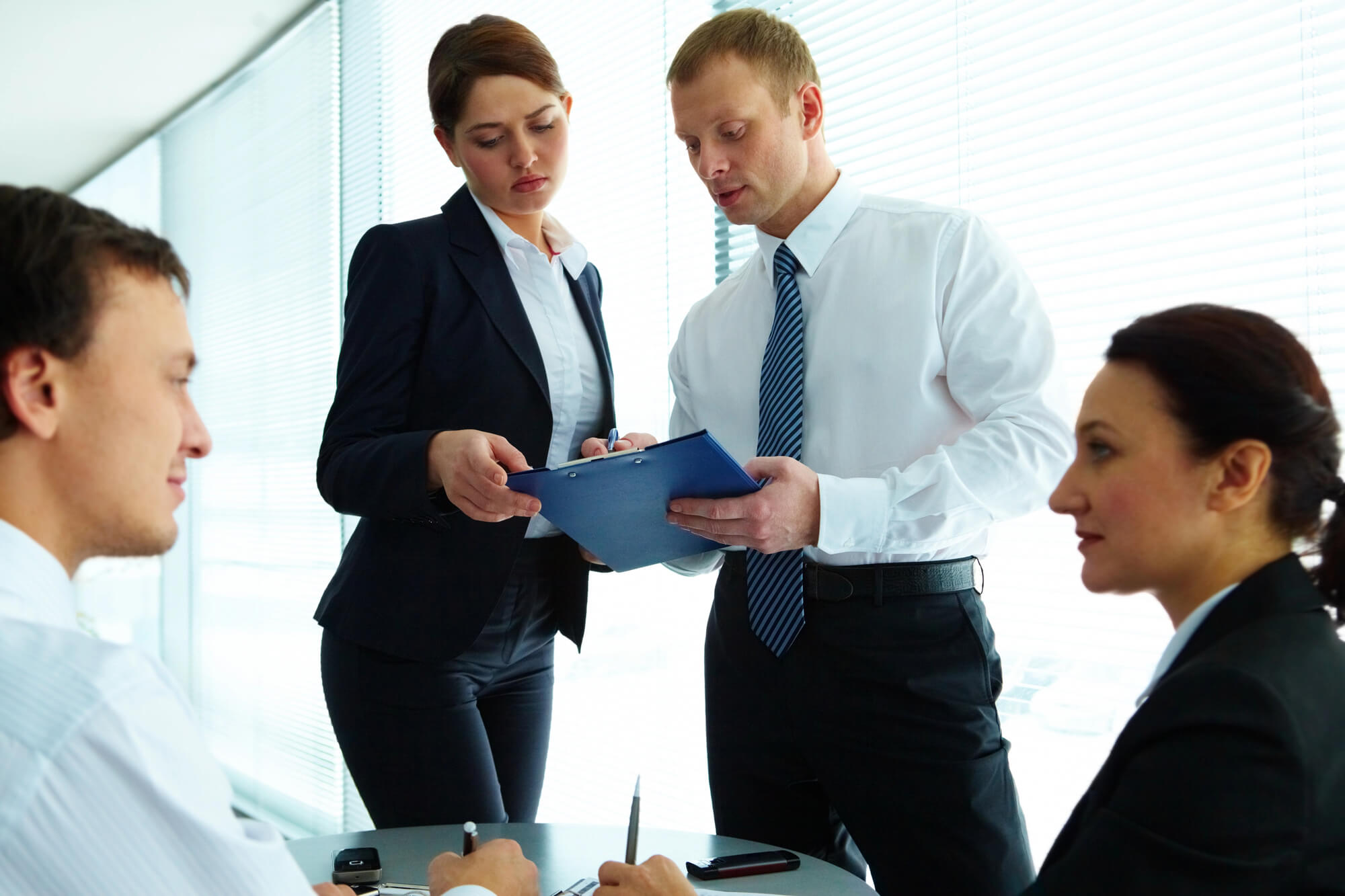 manager reviewing with team