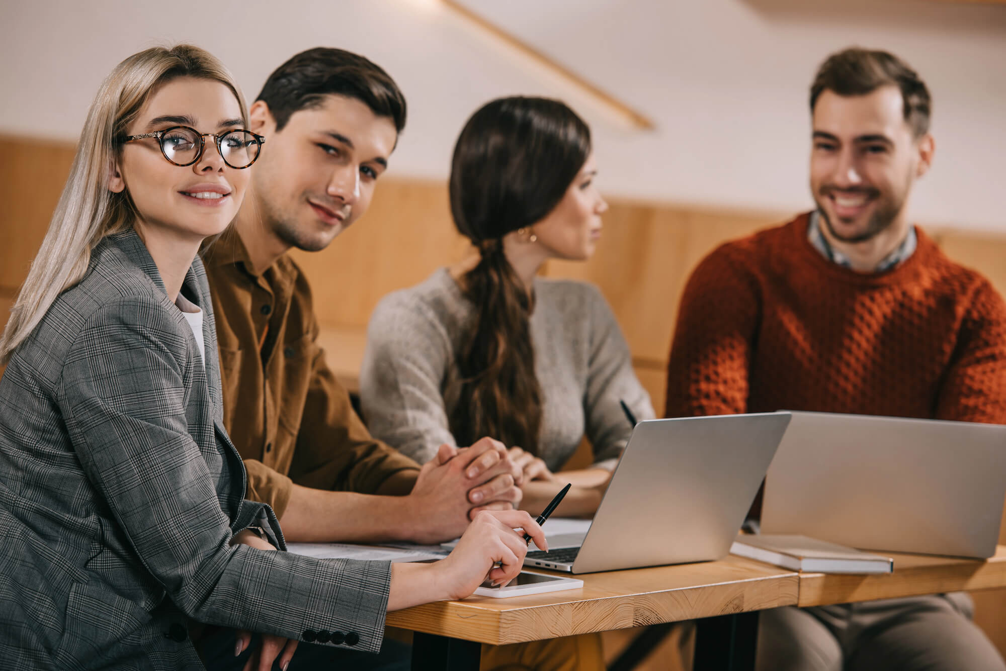 team of remote workers in a cafe