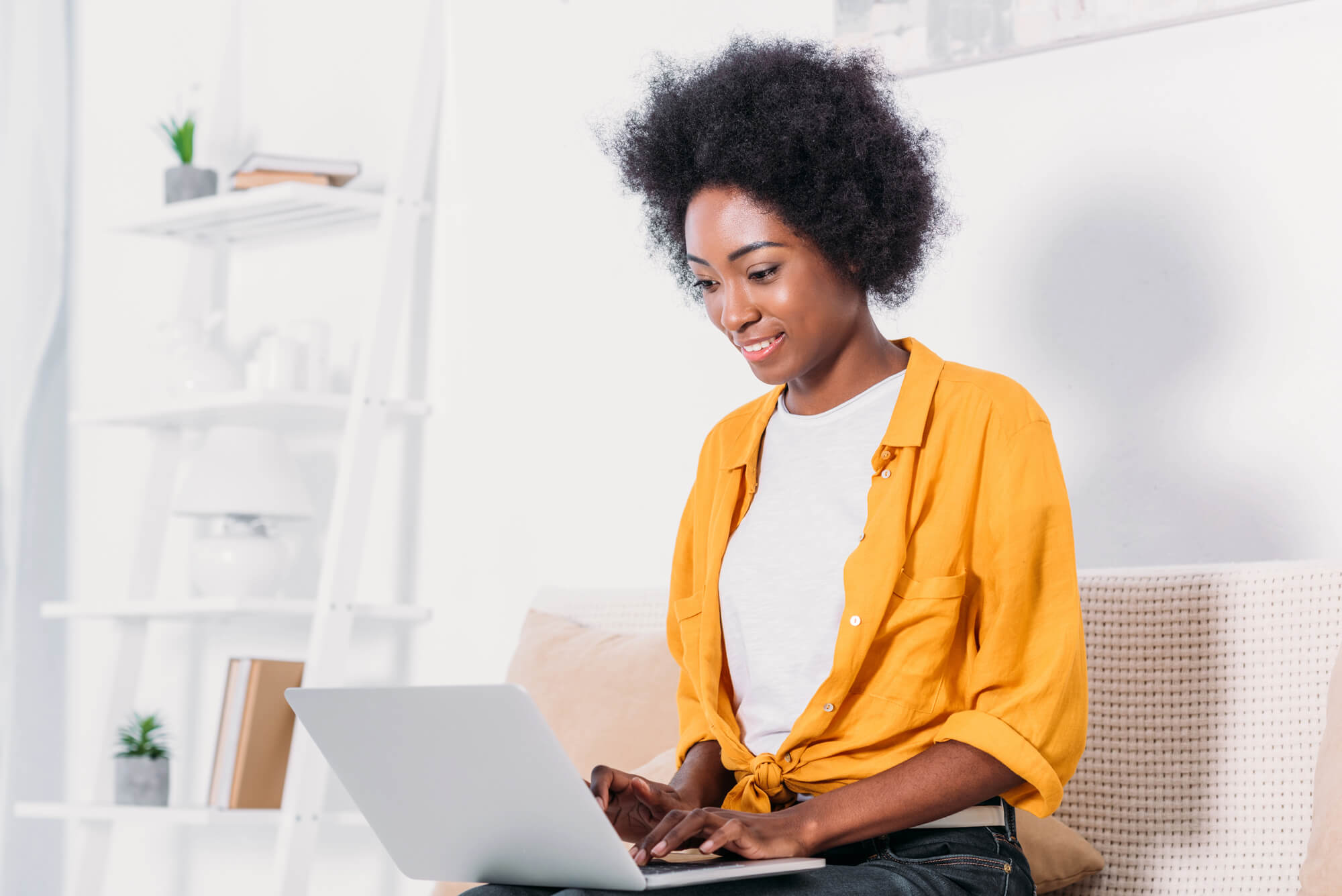 woman booking an appointment online looking satisfied