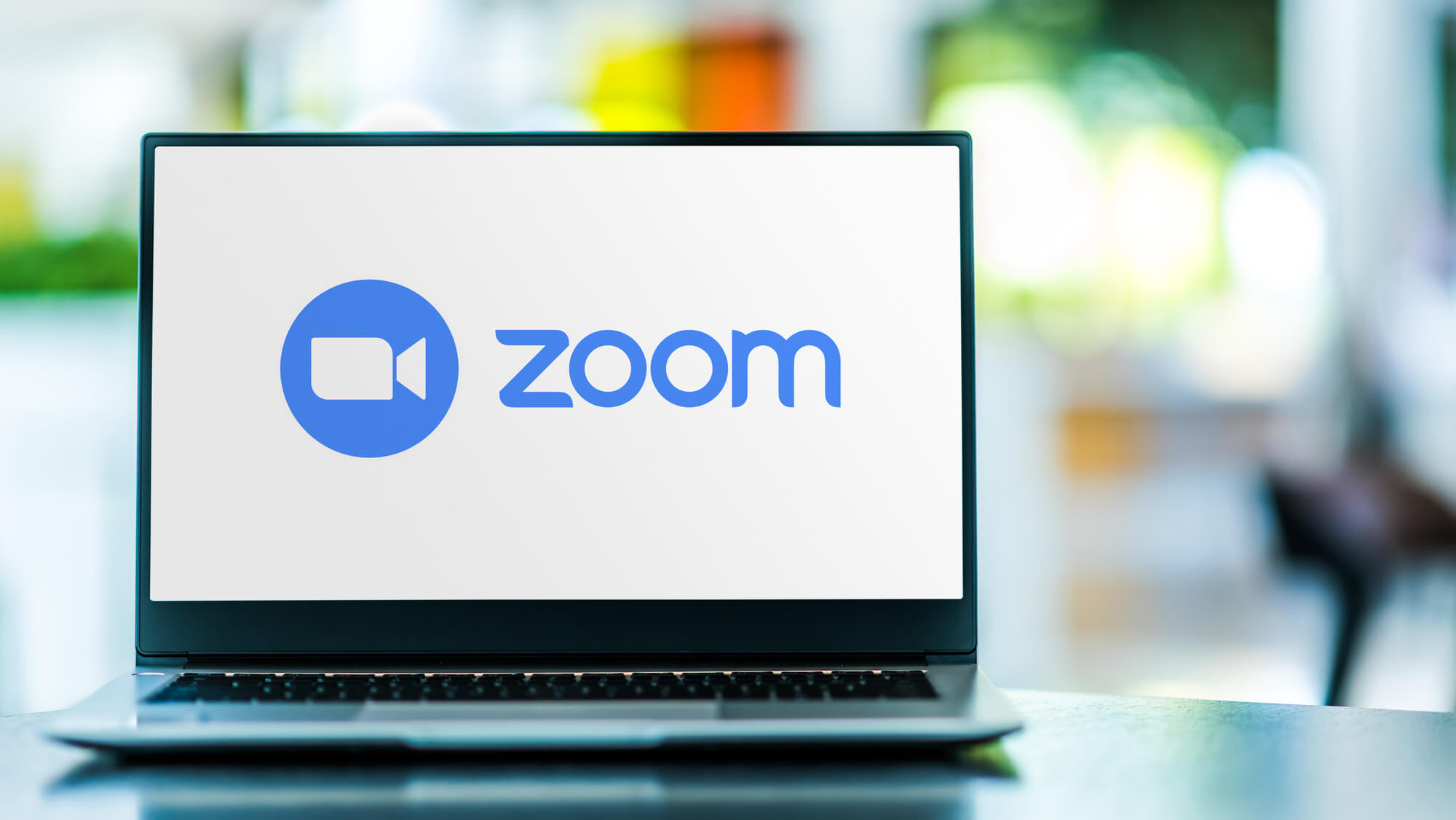 laptop showing zoom app