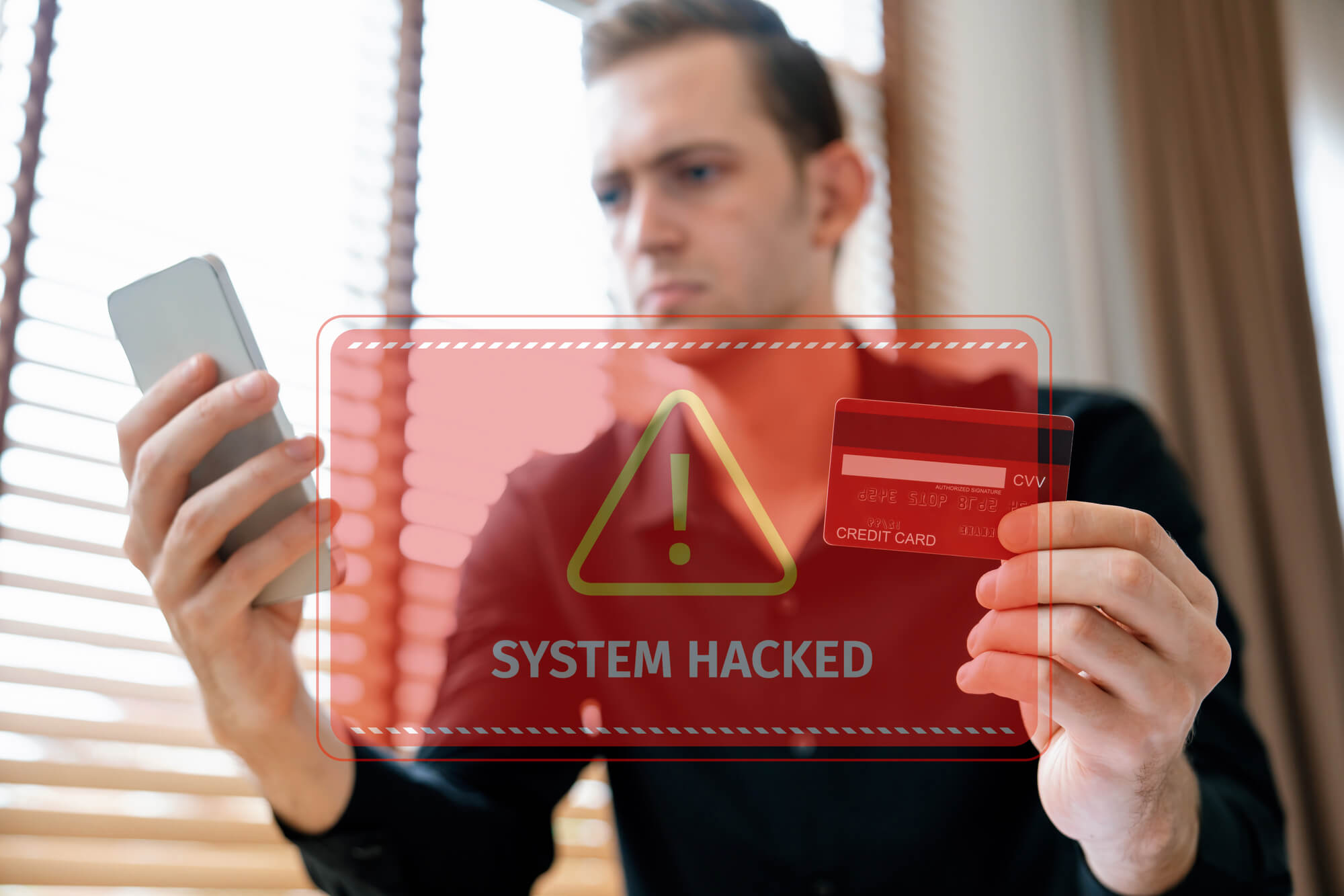 hologram interface warning a hacked system as a man buys something via phone using credit card