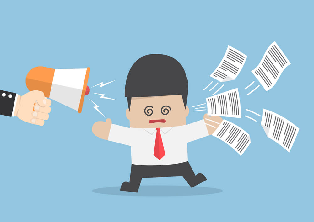 businessman frightened by megaphone social media marketing