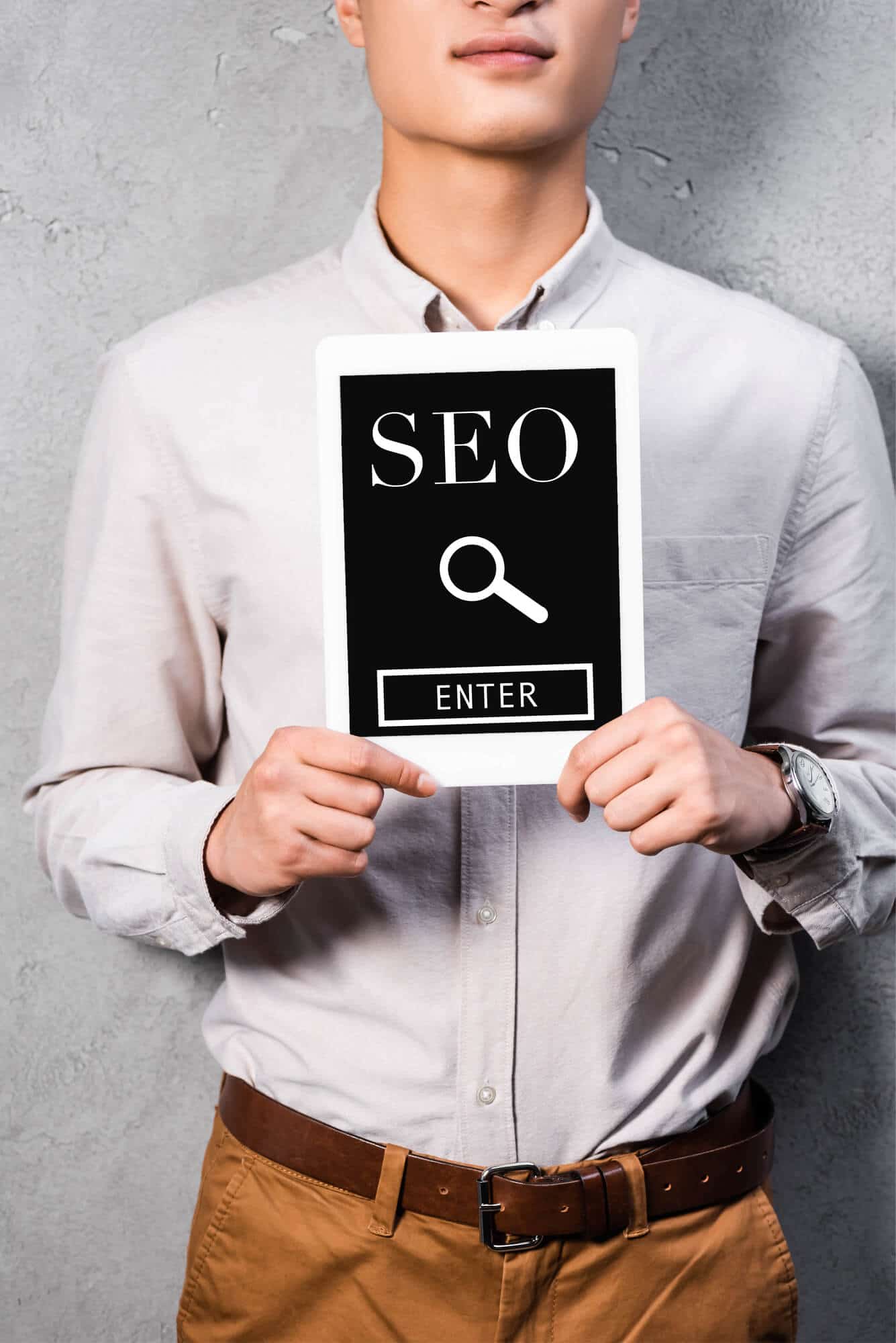 west palm beach man holding tablet displaying seo 