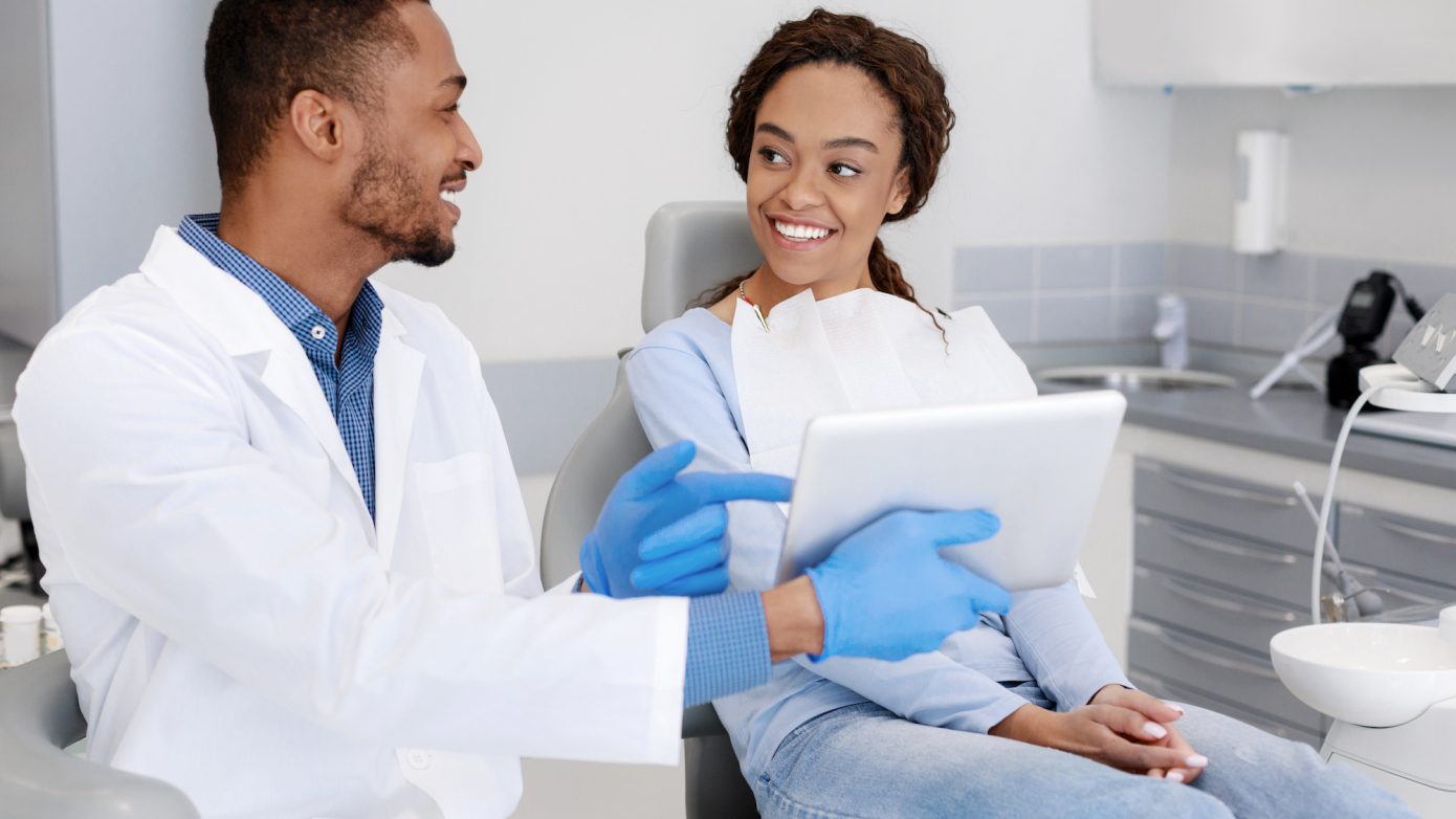 dentist talking to a patient