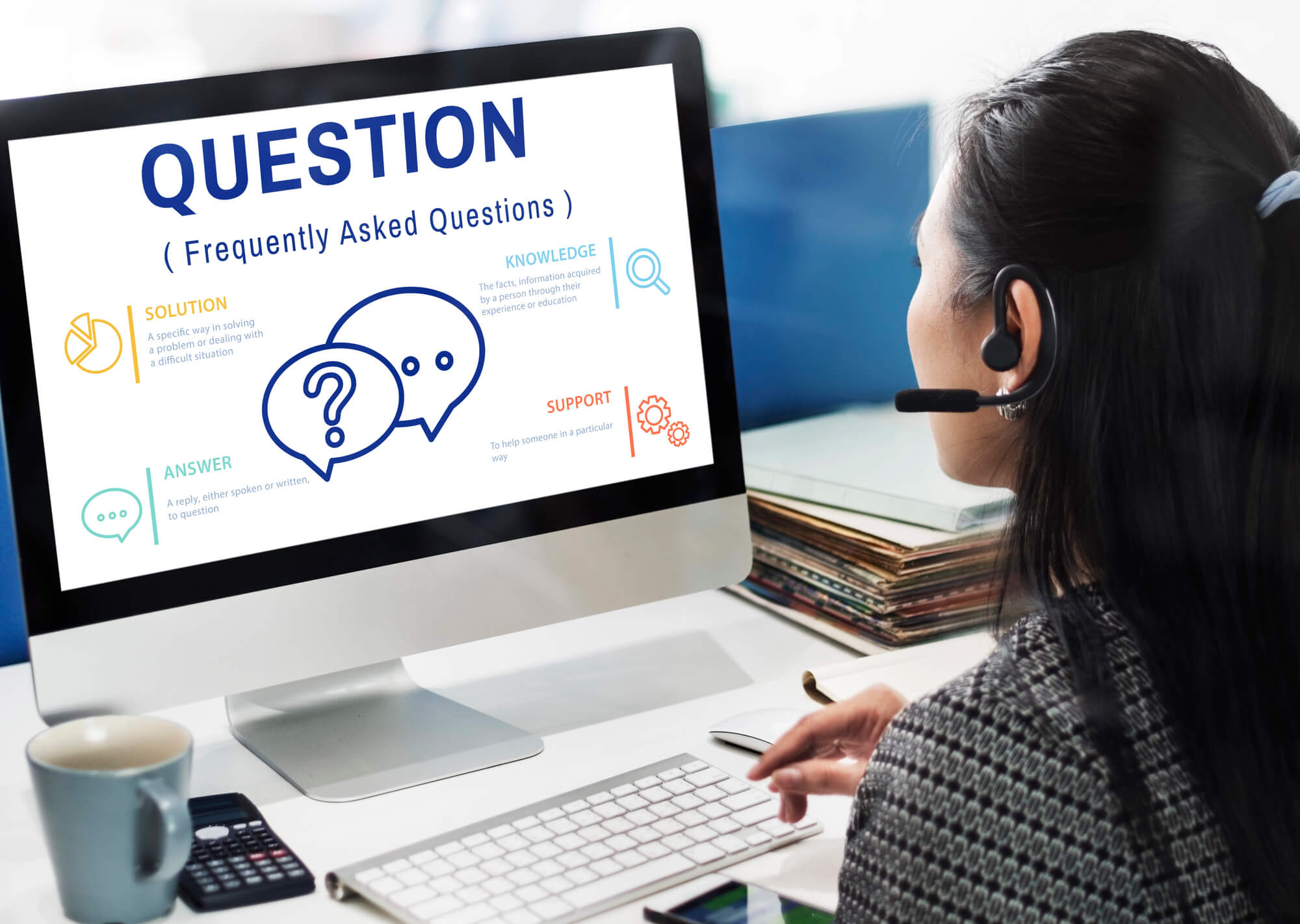 customer service rep looking at faq page