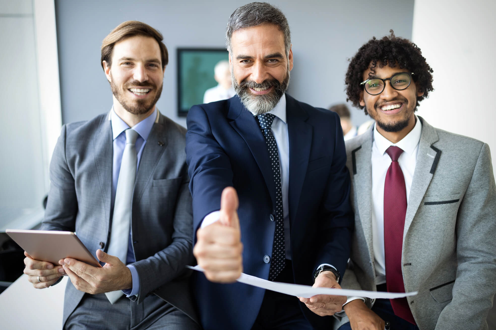 business leader and team celebrating