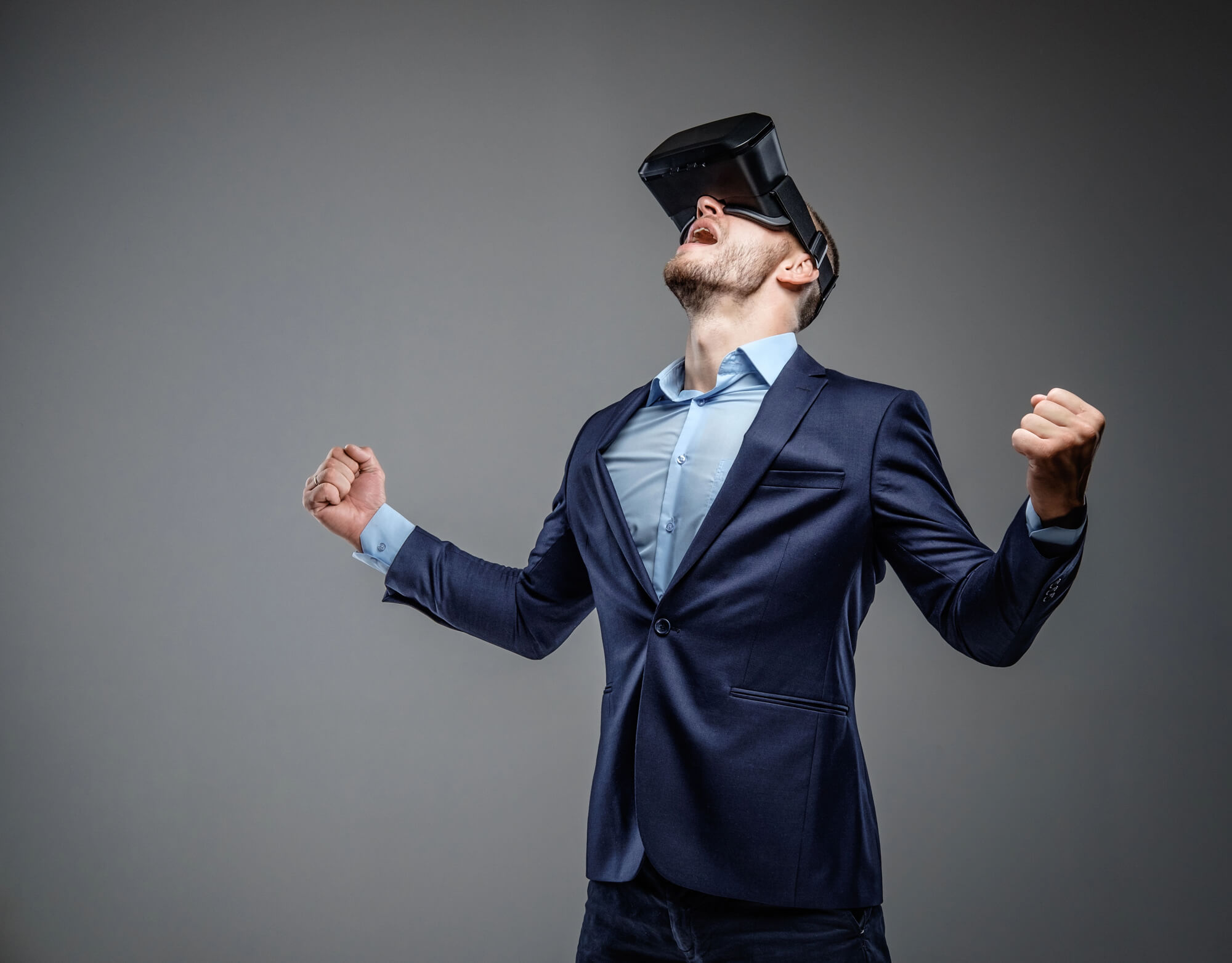businessman with vr glasses celebrating