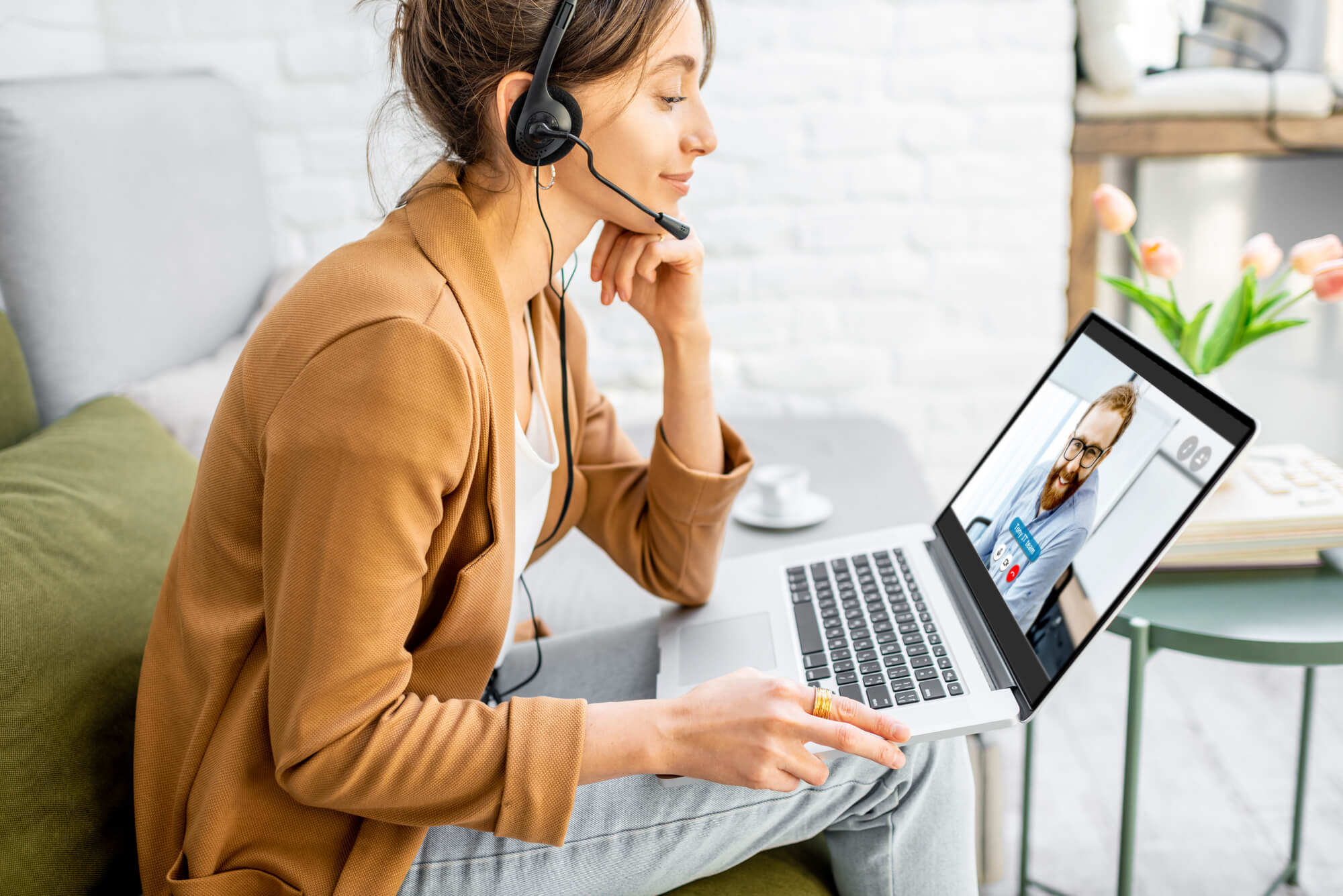 Woman in a video conference at home