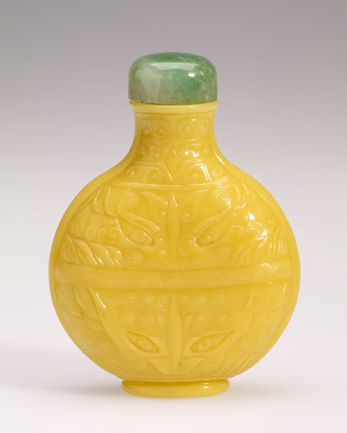 Imperial yellow glass with taotie masks