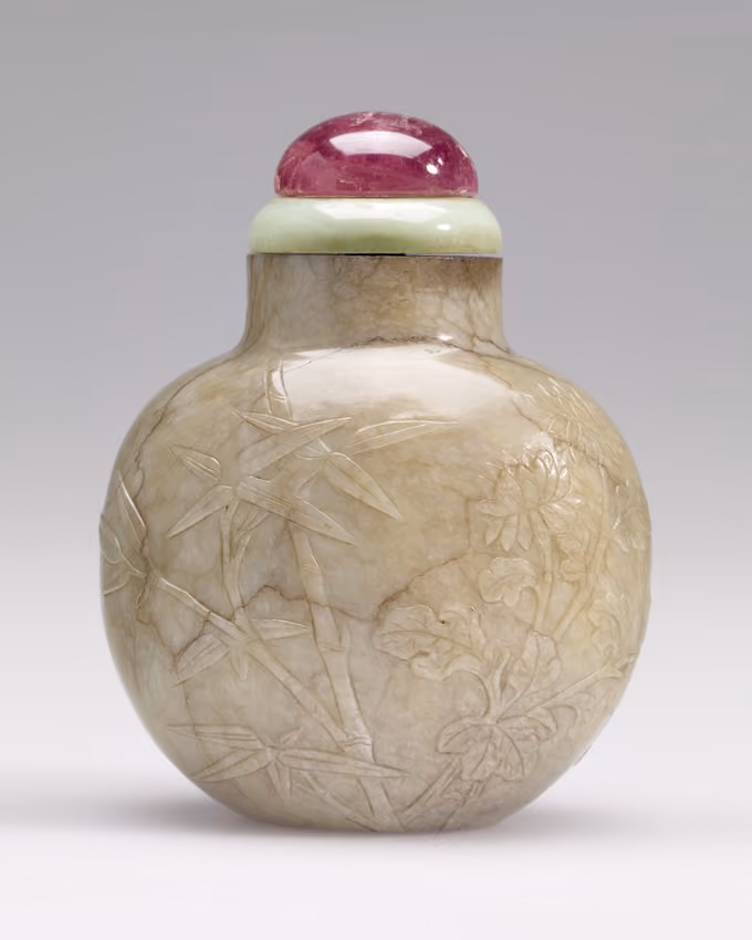 Calcified nephrite with bamboo, chrysanthemum and inscription