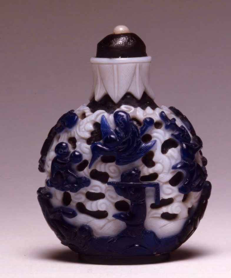 Double-overlay glass with blue on white on black ground