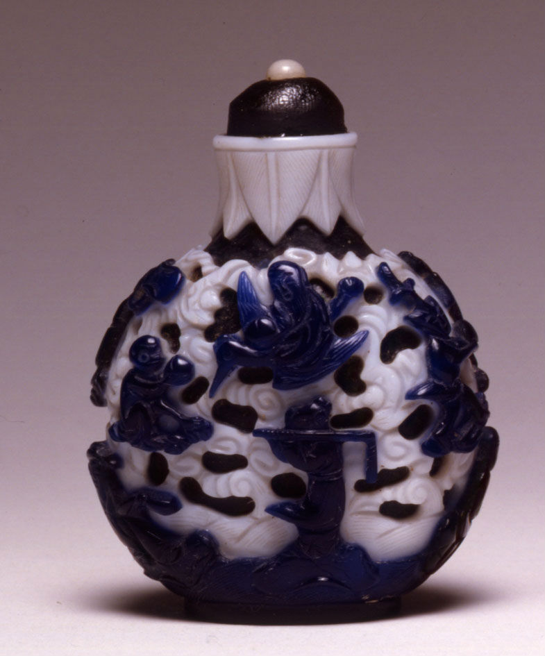 Double-overlay glass with blue on white on black ground