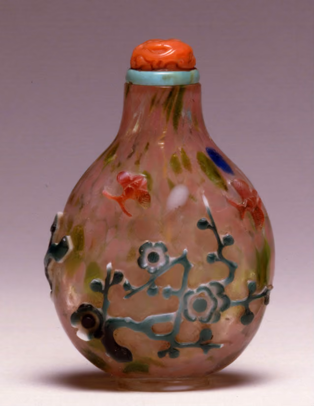 Unusual multi-color glass overlay with flowering prunus and butterflies on mottled ground