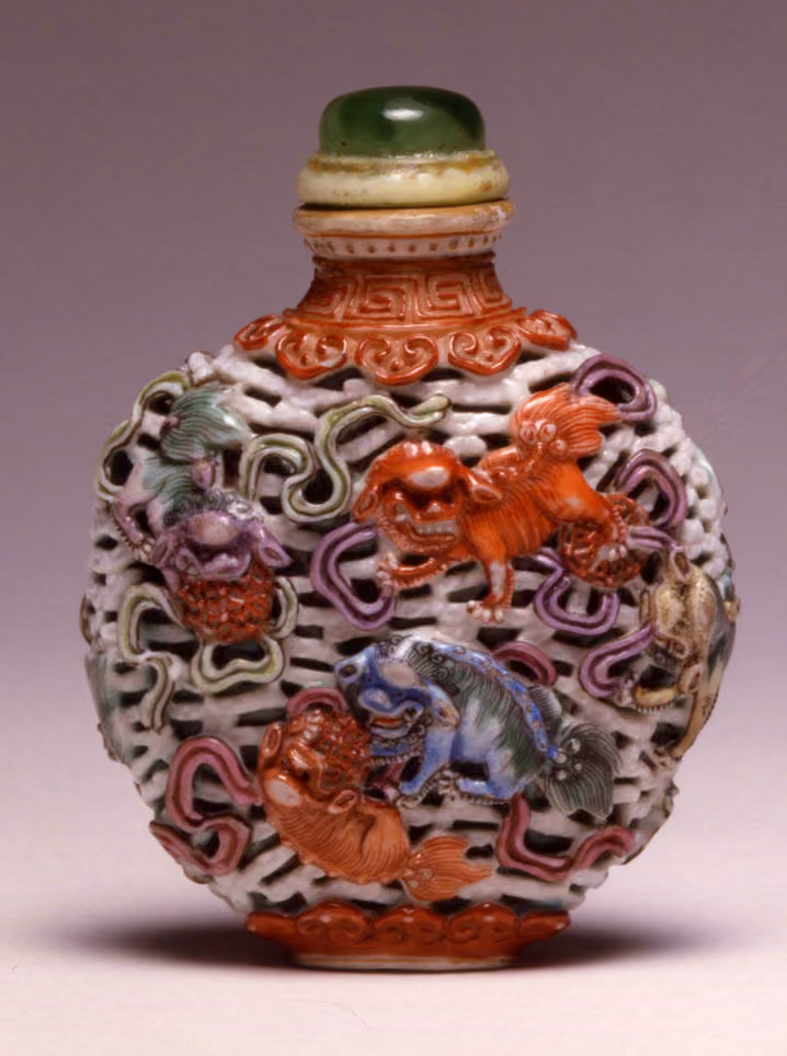 Molded porcelain with Buddhist lions playing