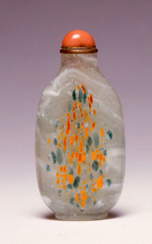Mottled glass with orange and green splashes