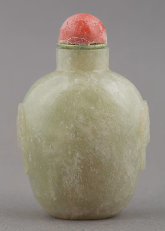 Pale green jade with taotie