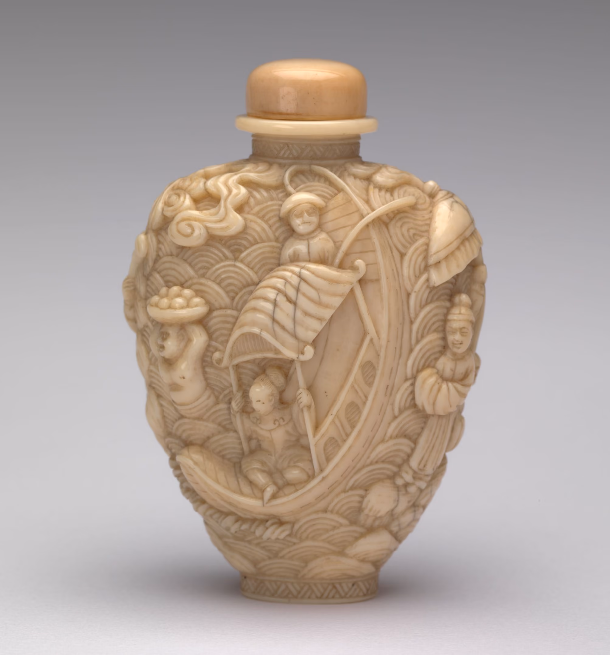 Ivory carved with scene from the Legend of the White Snake
