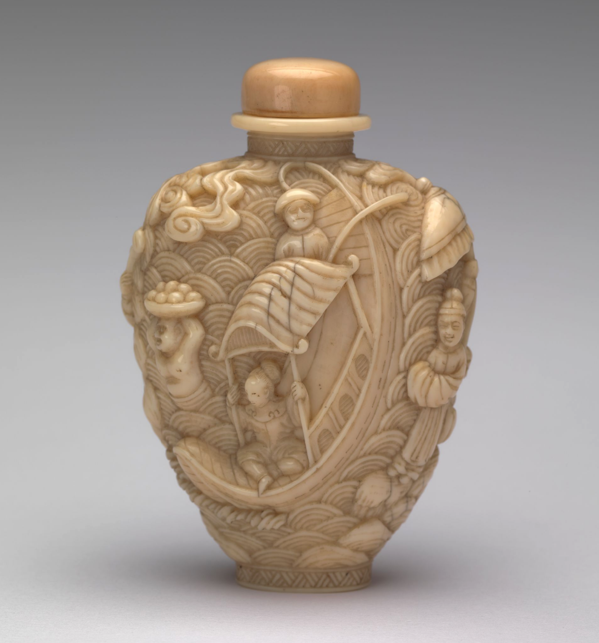 Ivory carved with scene from the Legend of the White Snake