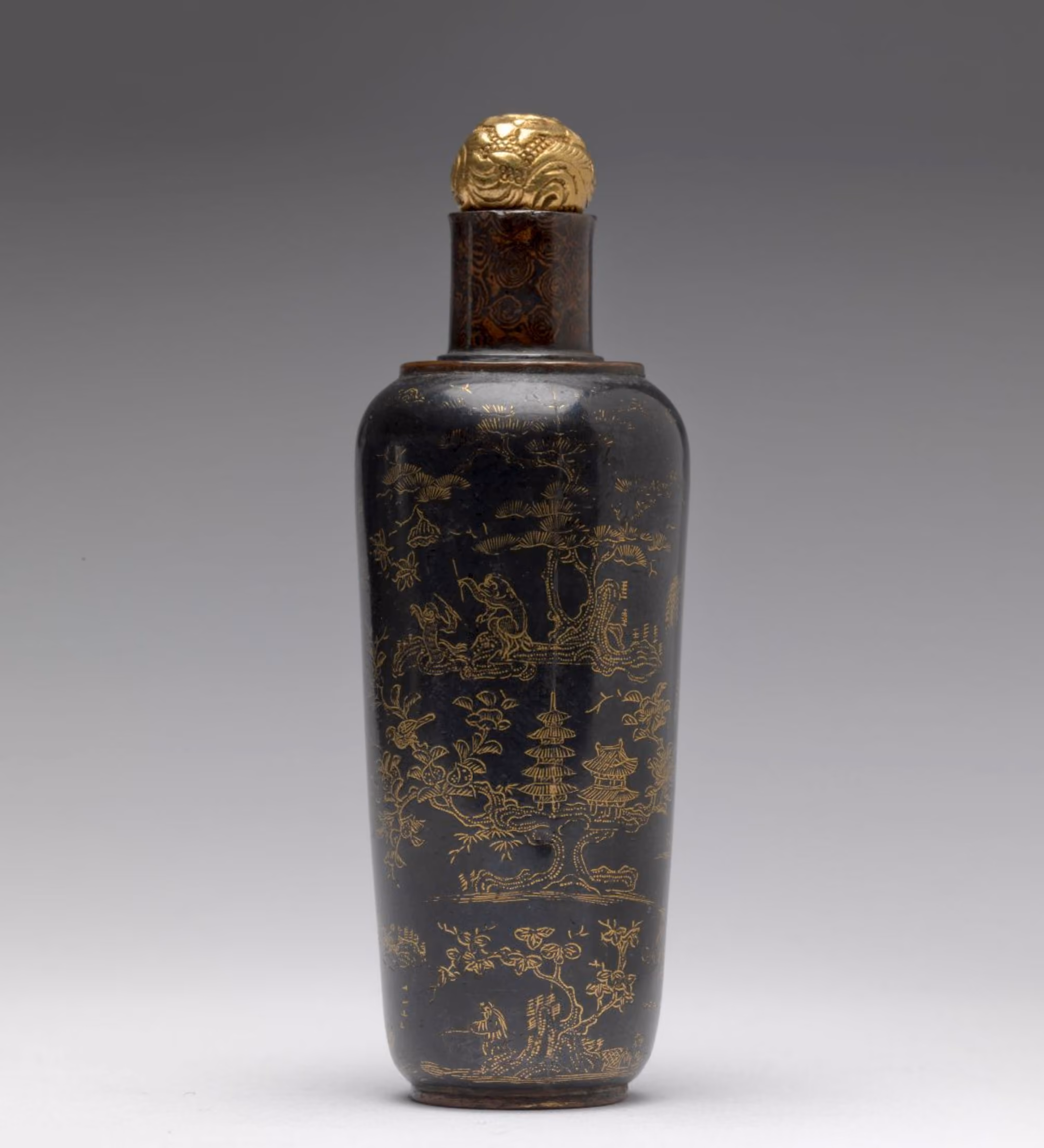 Gold-inlaid metal with landscape and genre scenes