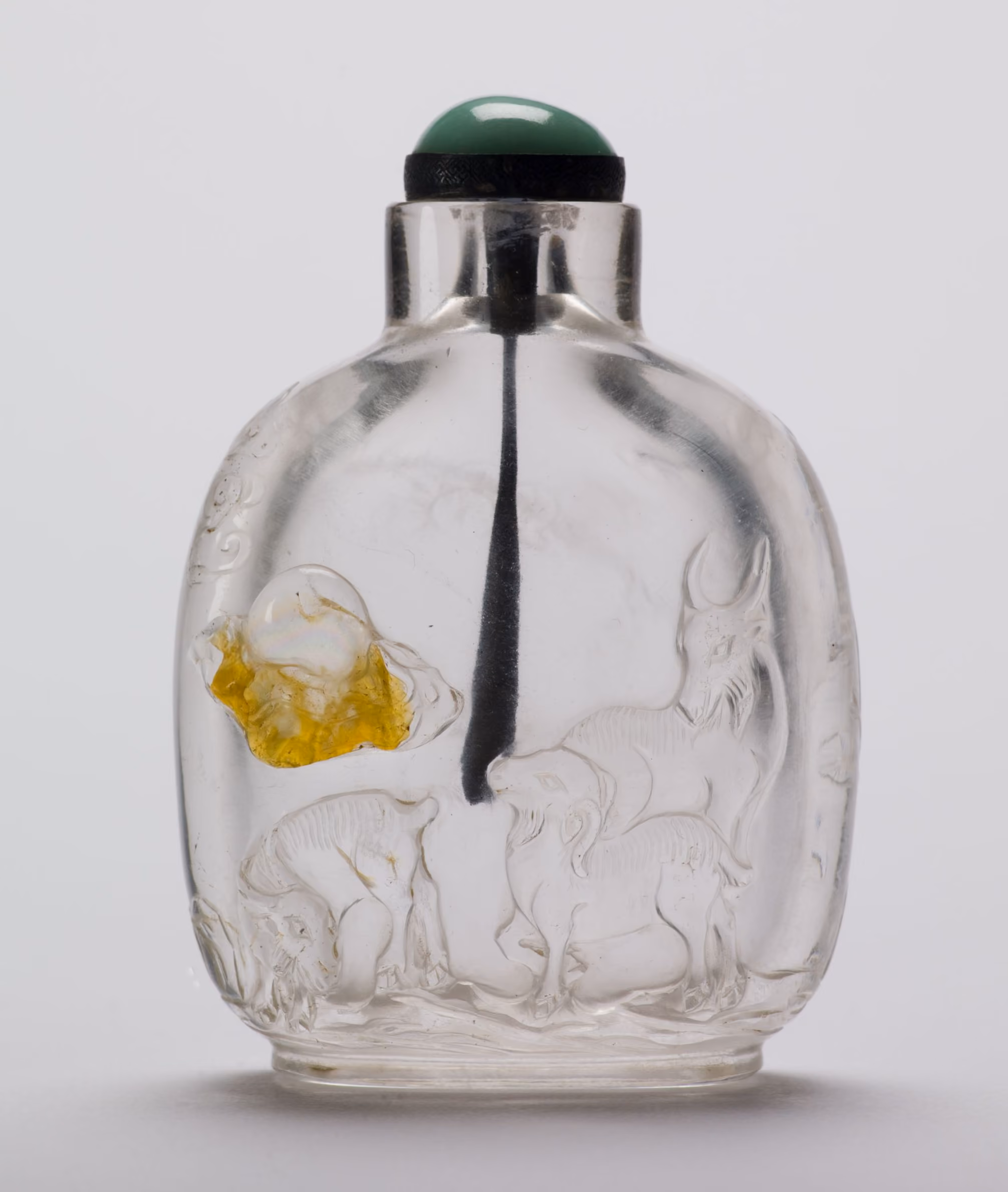 Crystal carved with goats