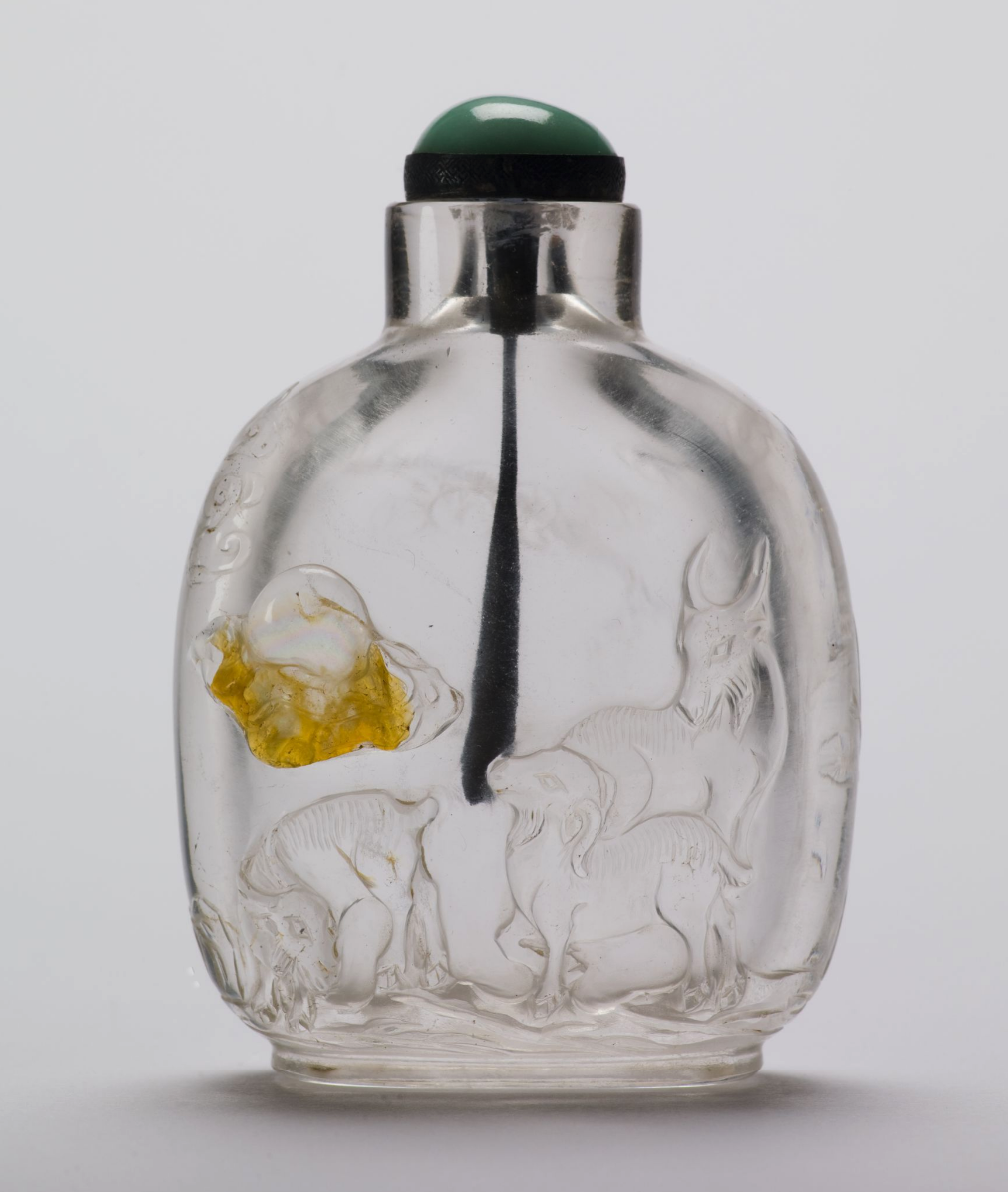 Crystal carved with goats