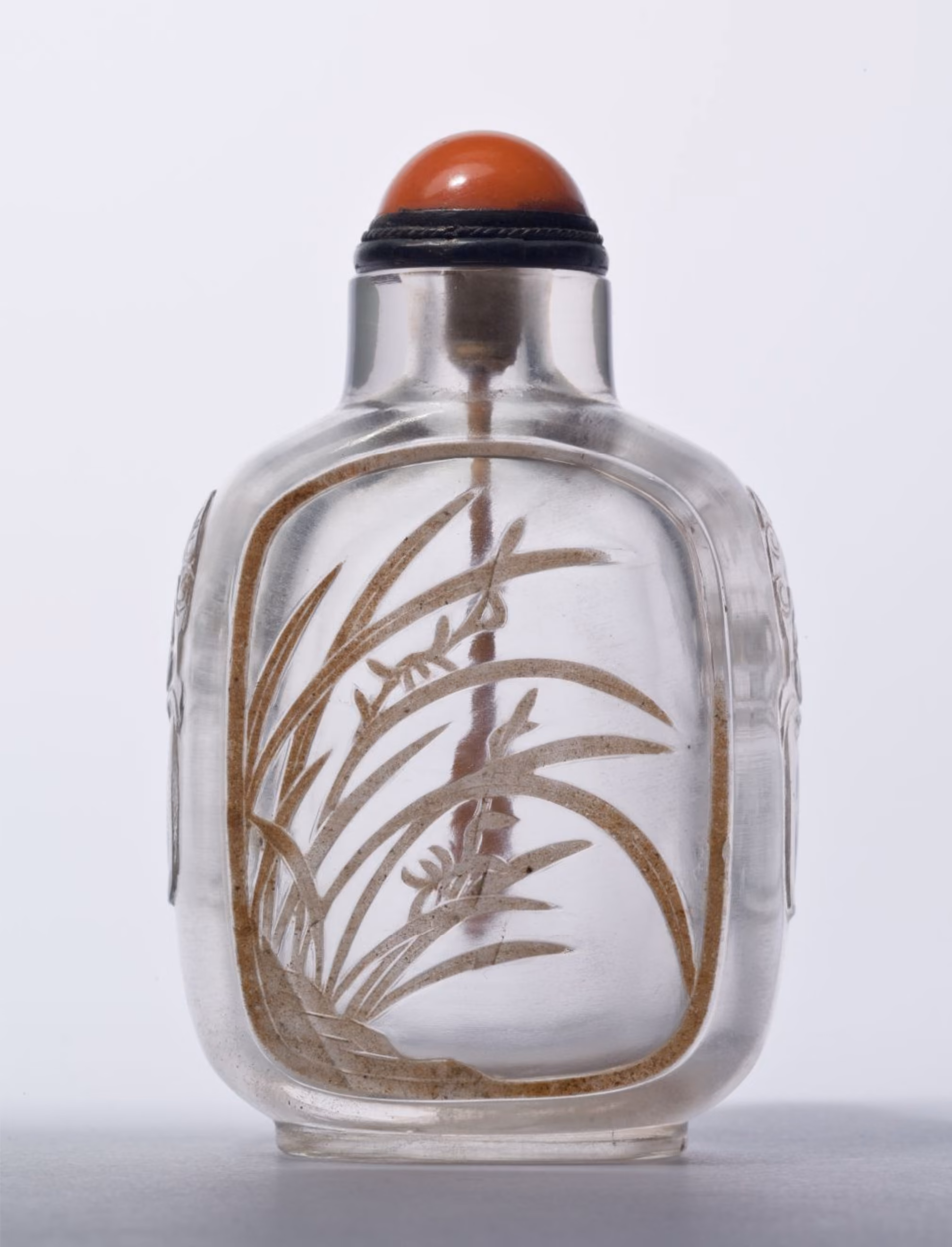 Crystal carved with cymbidium orchid