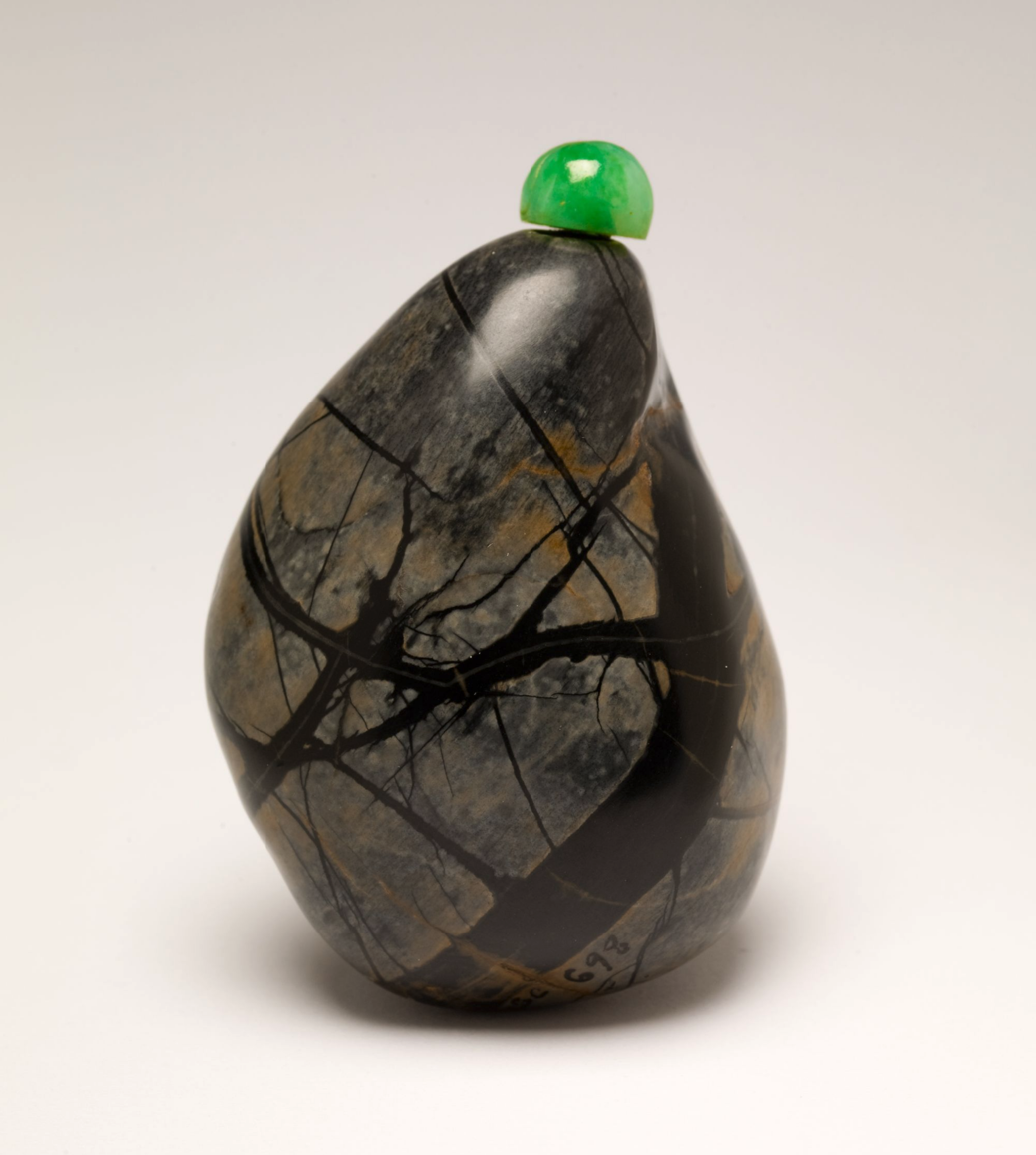 Limestone breccia pebble with jagged inclusions