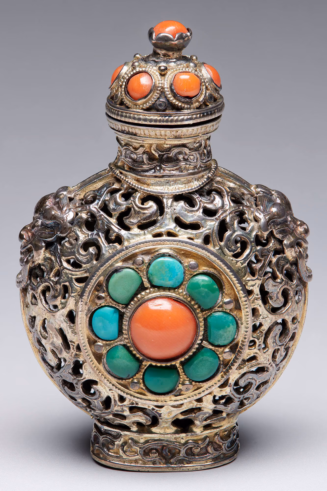 Gilded silver with turquoise and coral