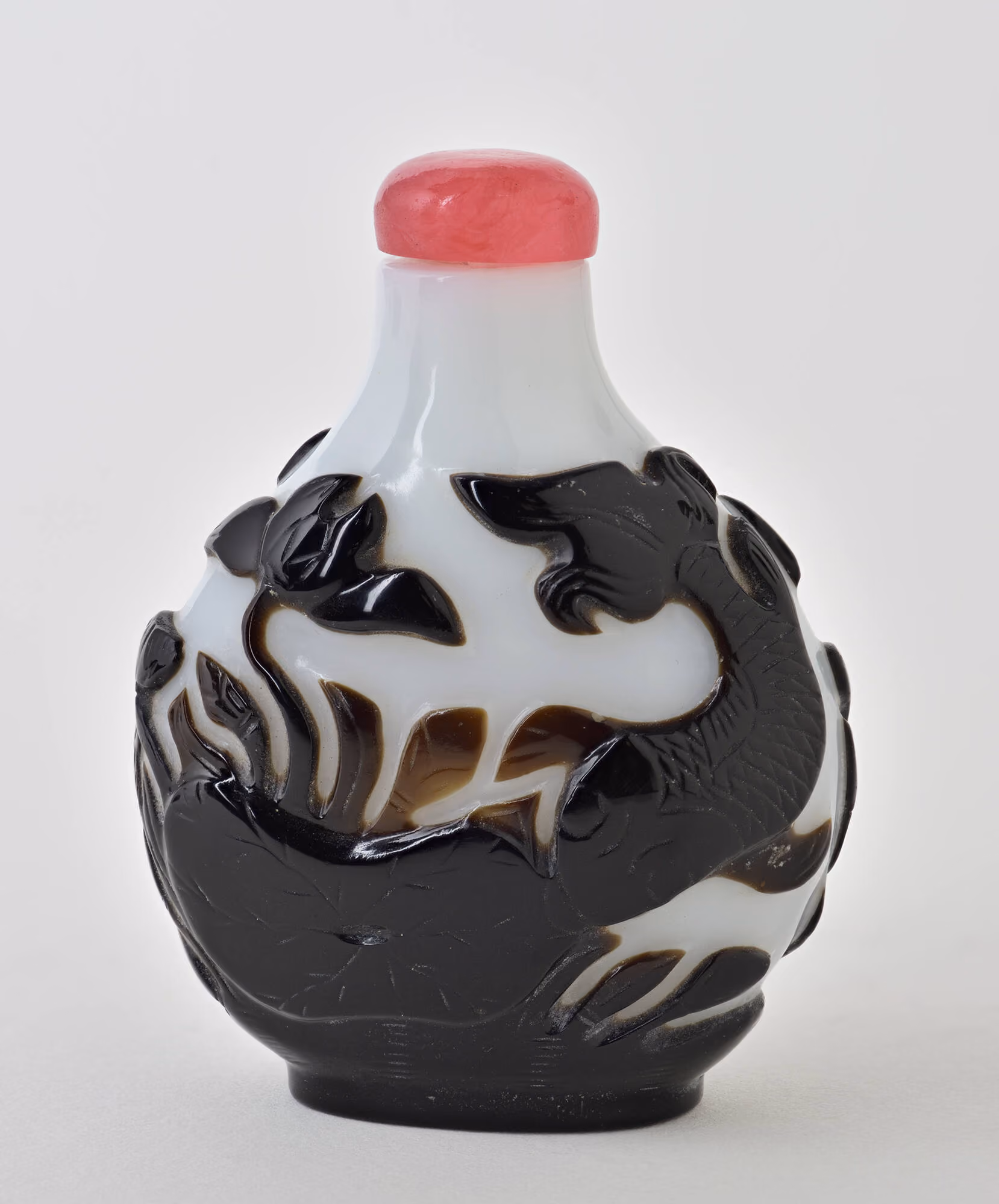 Black overlay glass on milk white ground