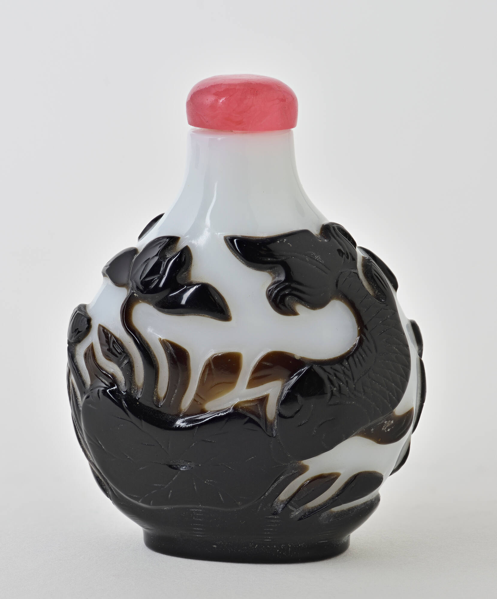 Black overlay glass on milk white ground
