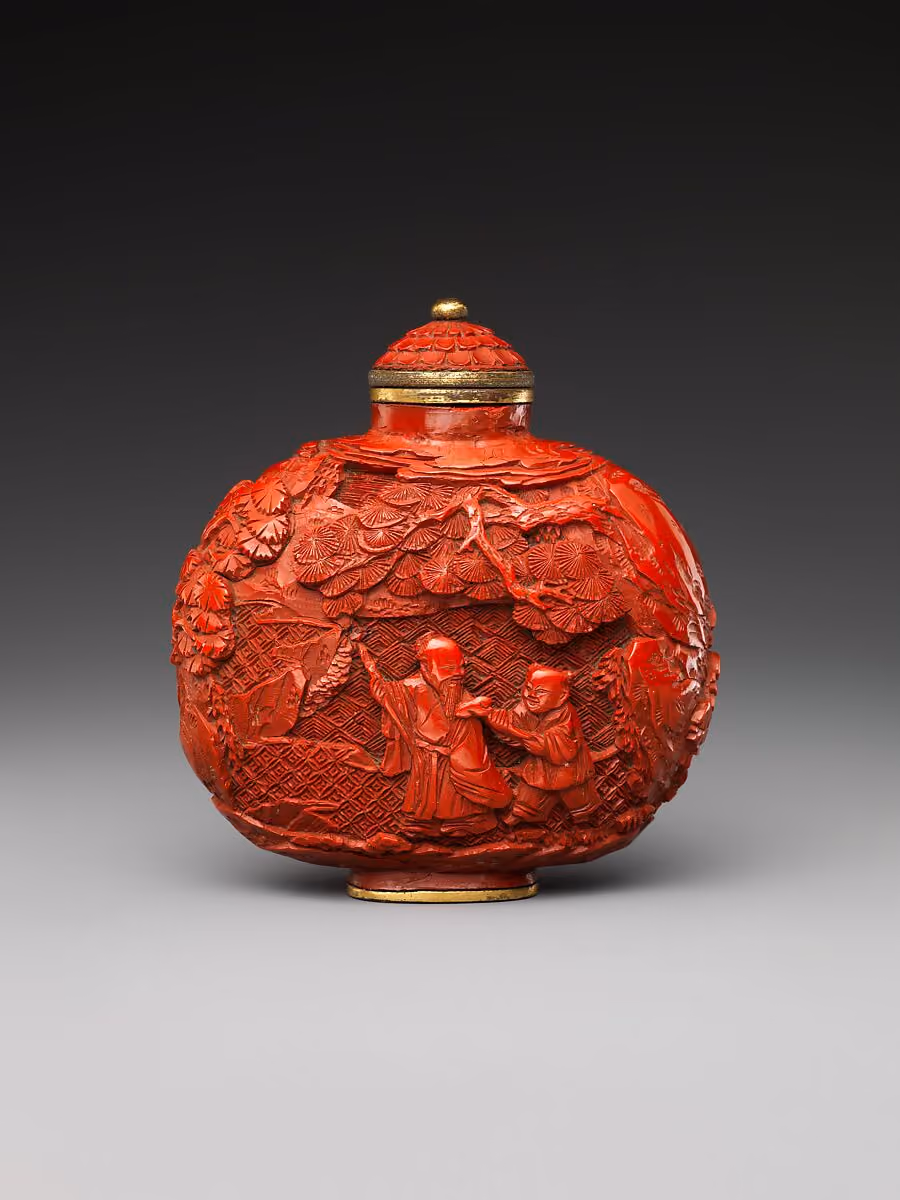 Carved red lacquer with figures in landscape