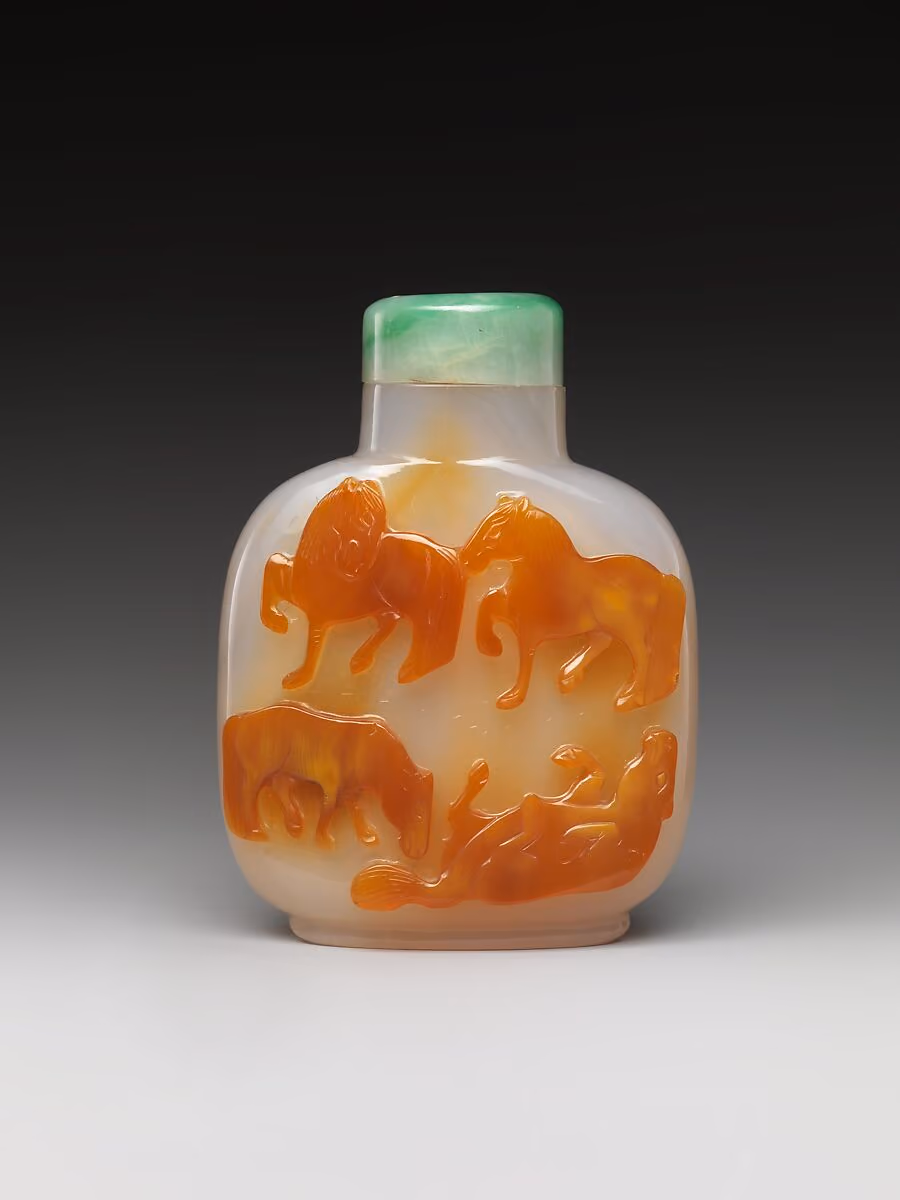 Chalcedony carved with Eight Horses of Mu Wang