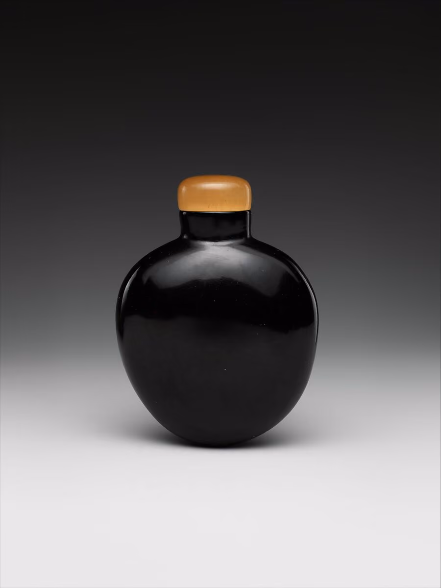 Black amber with yellow amber stopper