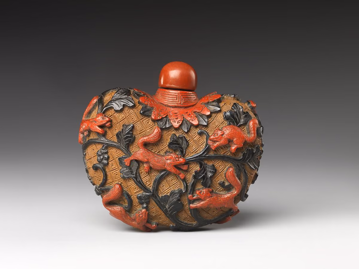 Carved polychrome lacquer with squirrels and grapes