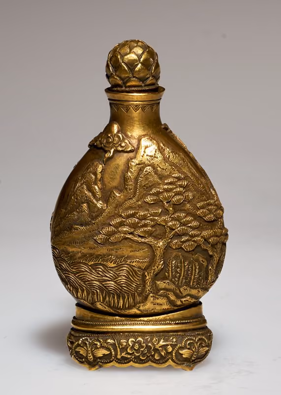 Gold with pine tree among fields and mountains