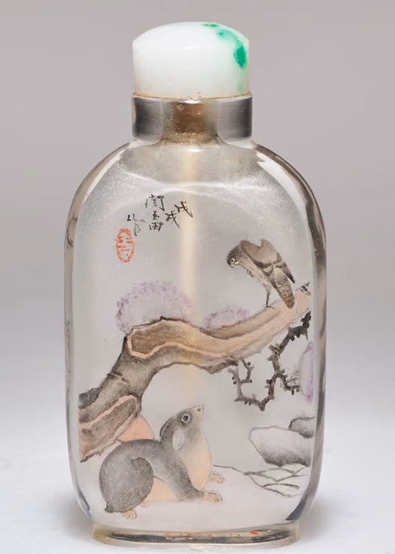 Inside-painted glass with hawk and rodent