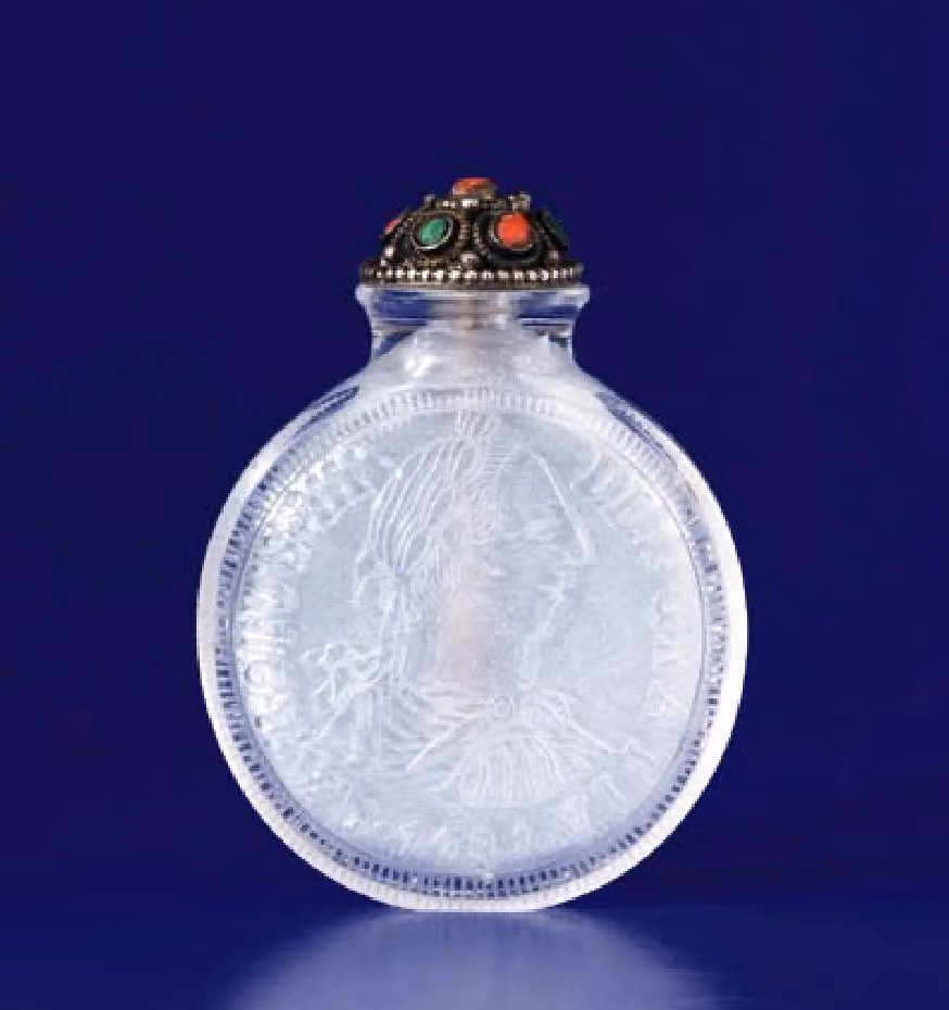 Crystal carved to simulate a Spanish Eight Reales coin