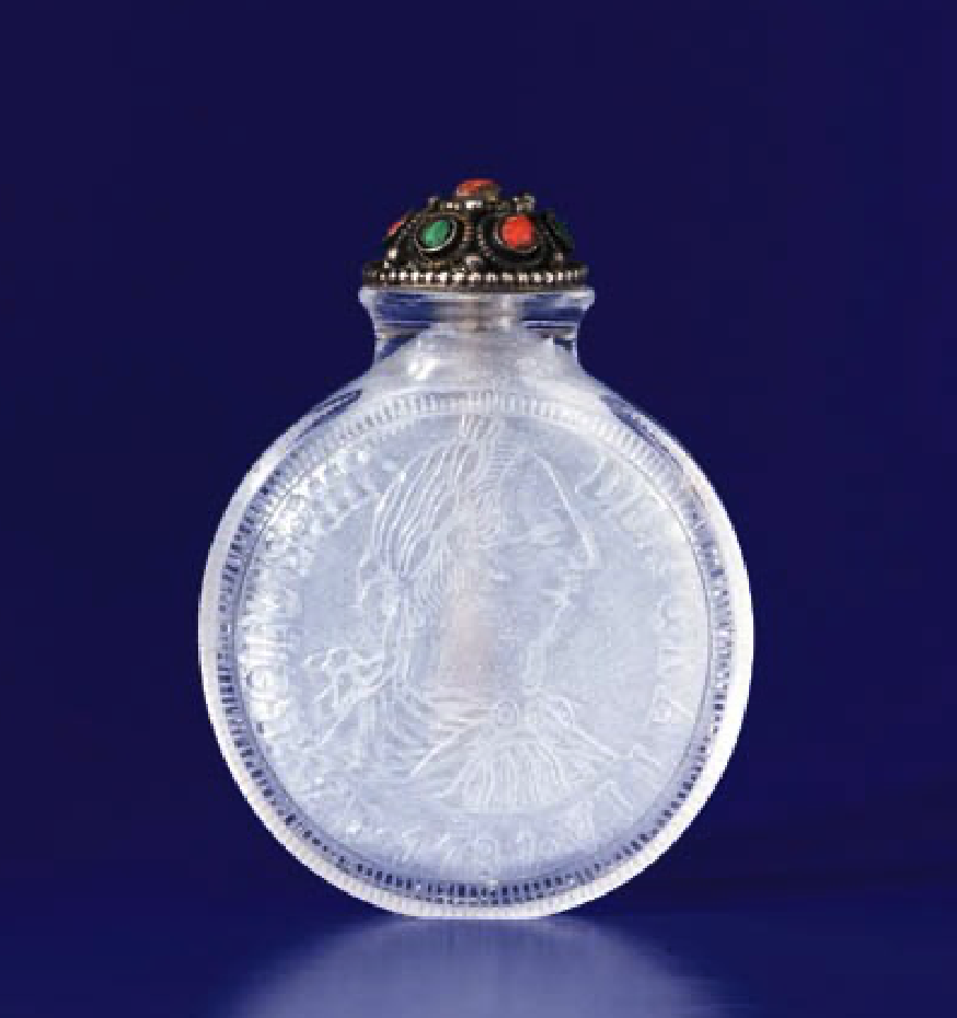 Crystal carved to simulate a Spanish Eight Reales coin
