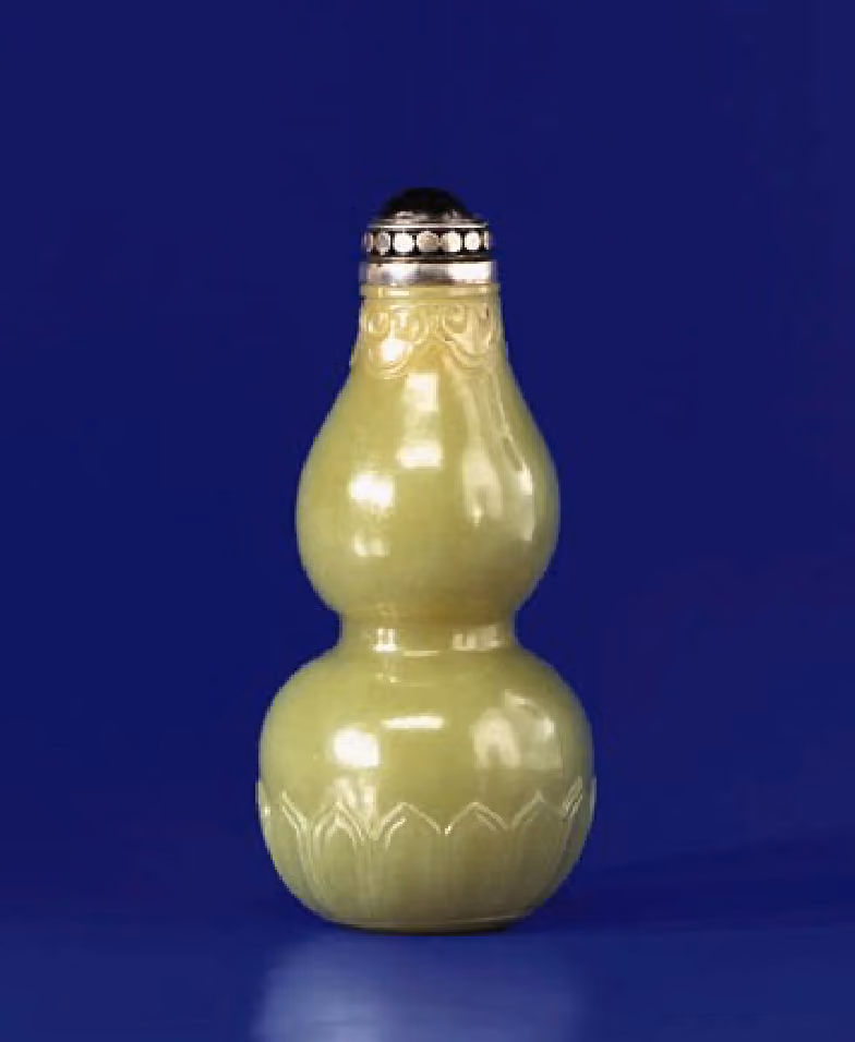 Yellow jade double gourd with ruyi and petal lappets