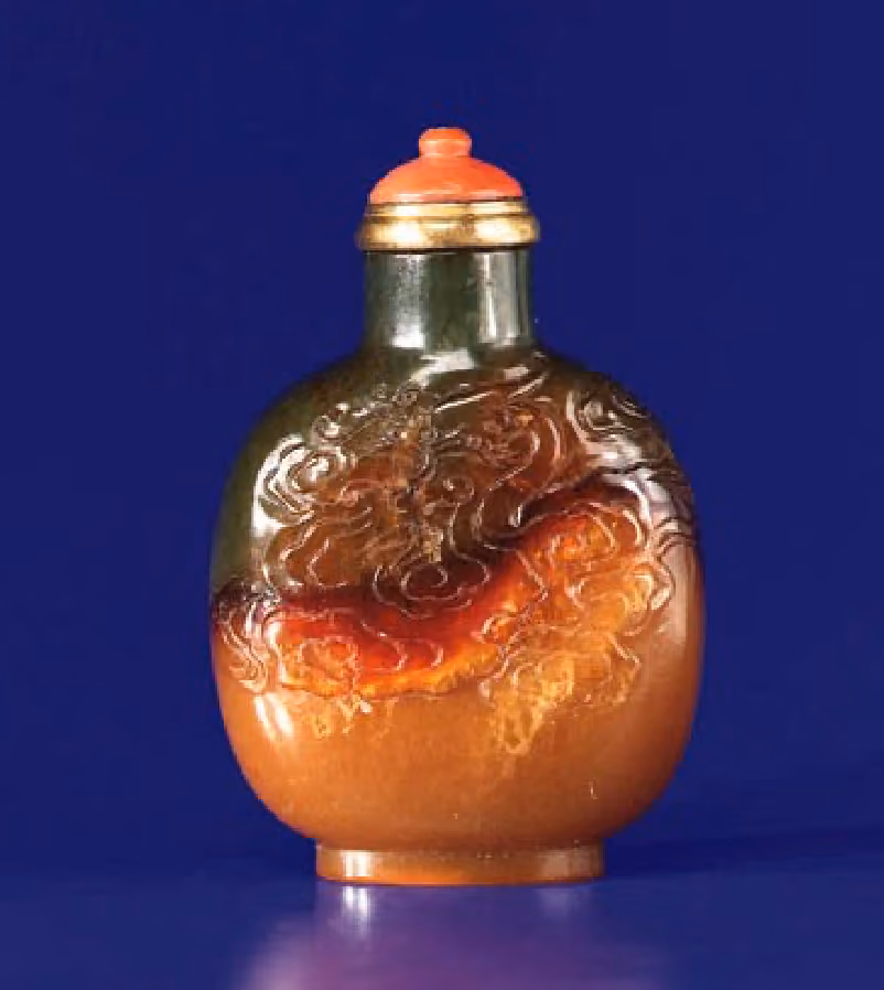 Serpentine carved with dragon and inscription