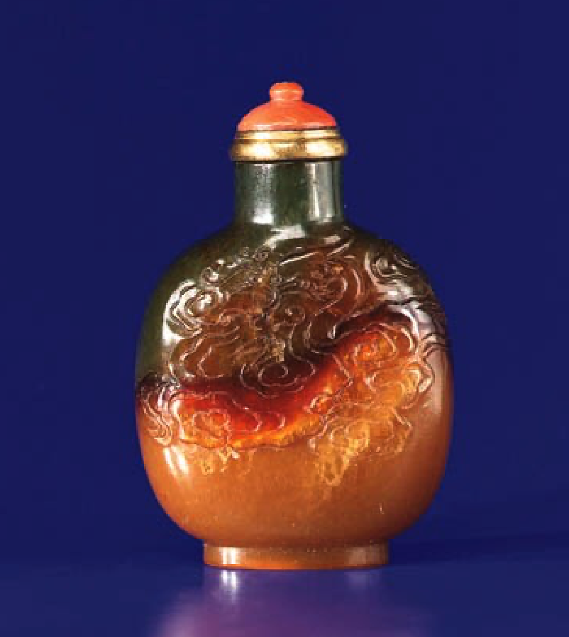 Serpentine carved with dragon and inscription