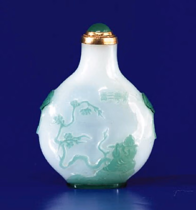 Pale green overlay on white glass with flautist and birds