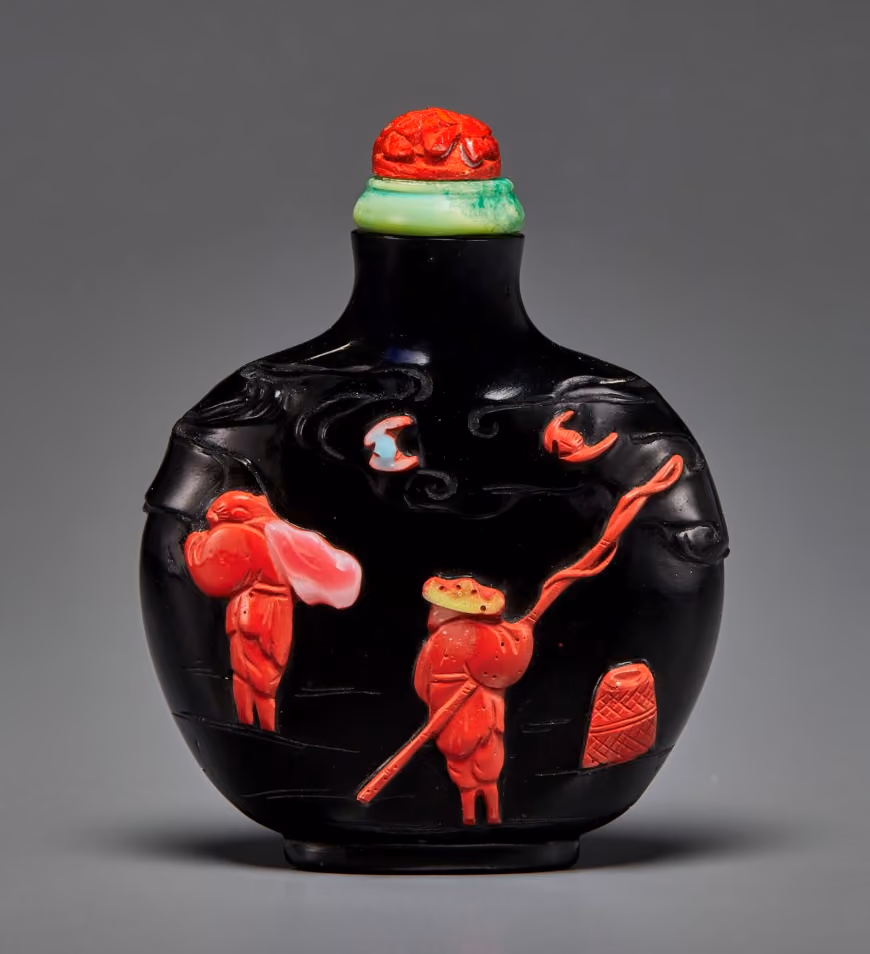 Cinnabar-red overlay on black glass with fishermen