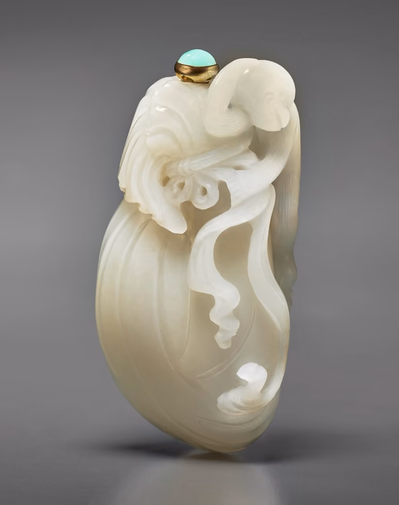 White jade in the form of a cinched sack with monkey
