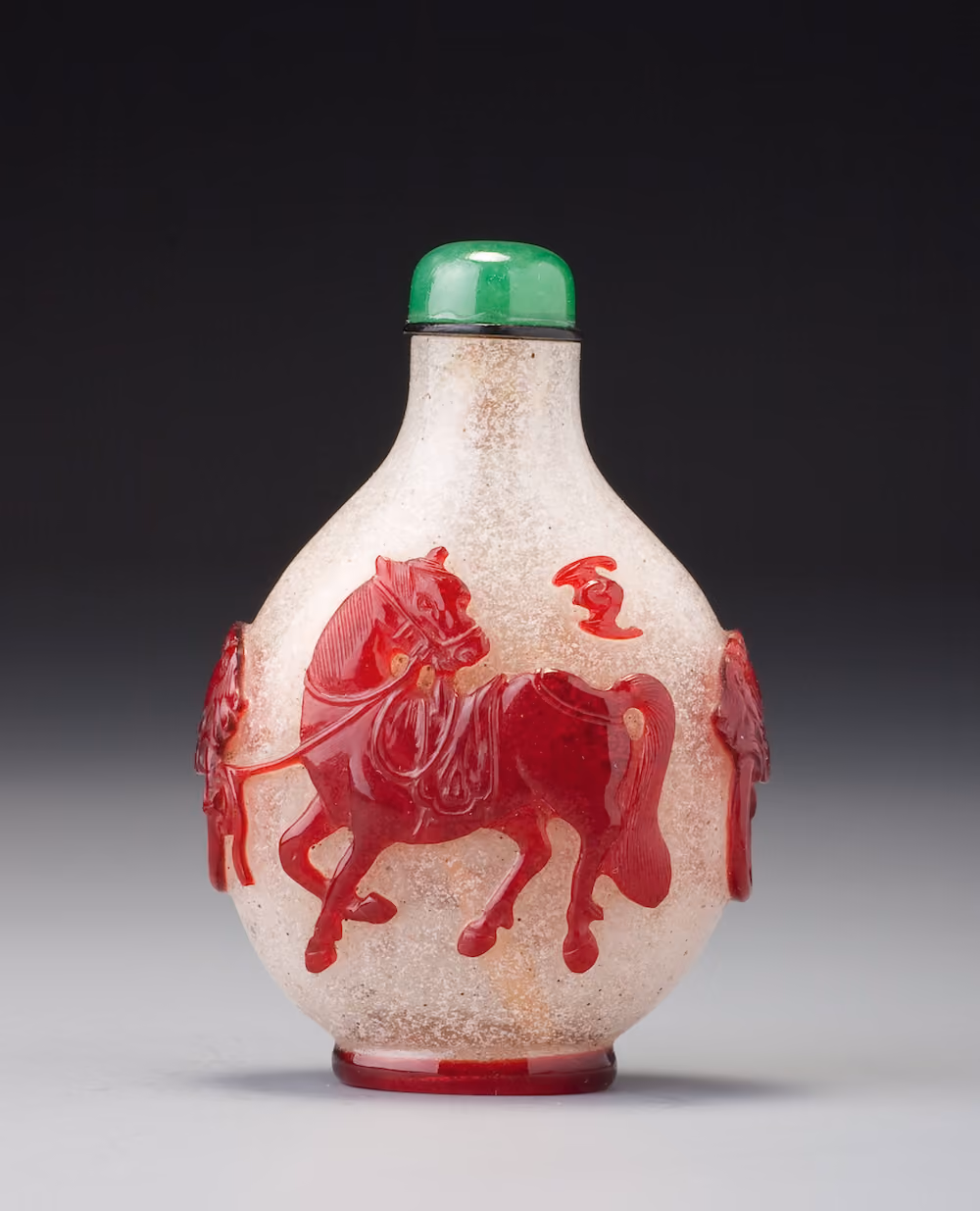 Red overlay glass with horses and bats