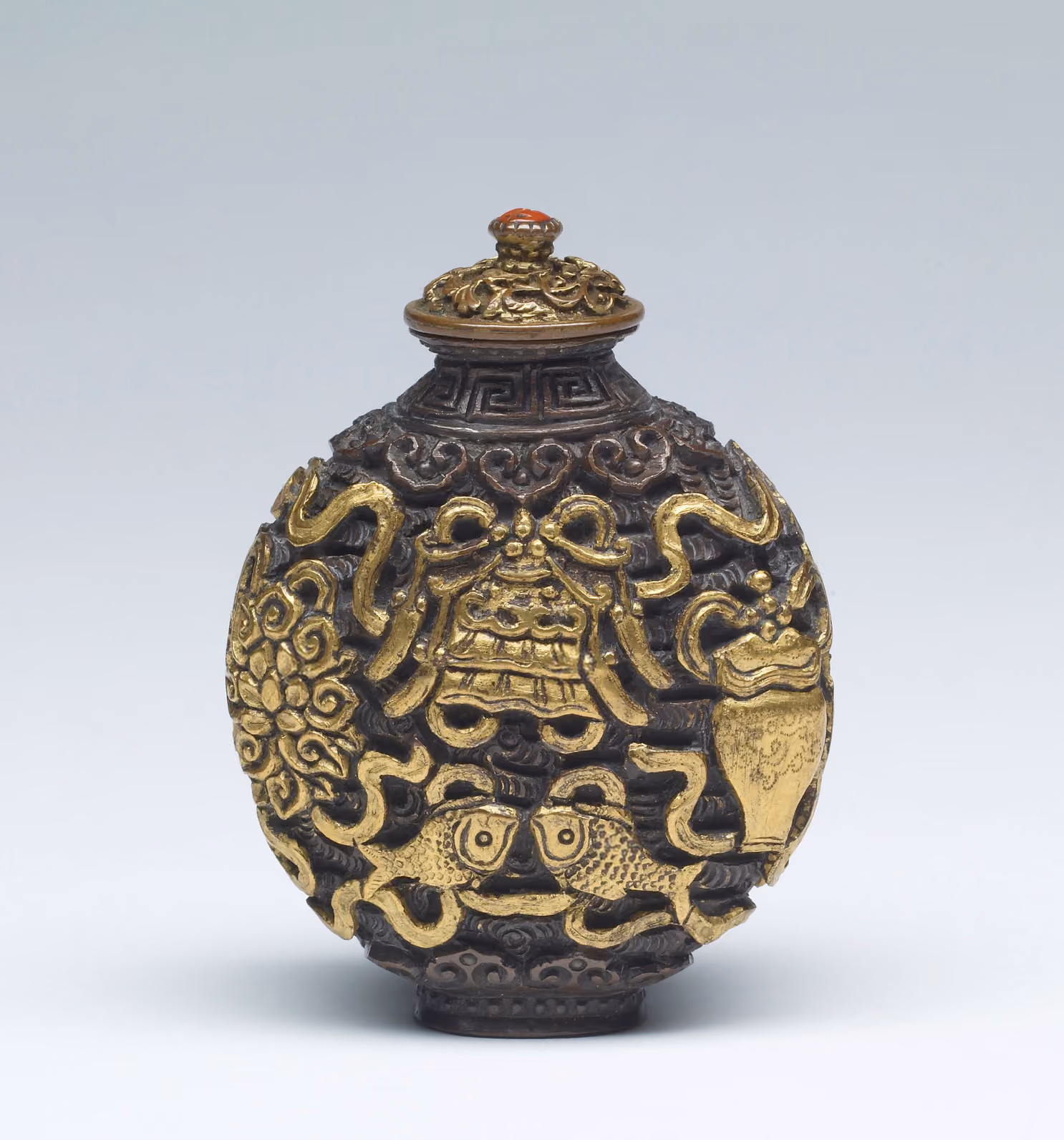 Cast copper alloy with Buddhist emblems