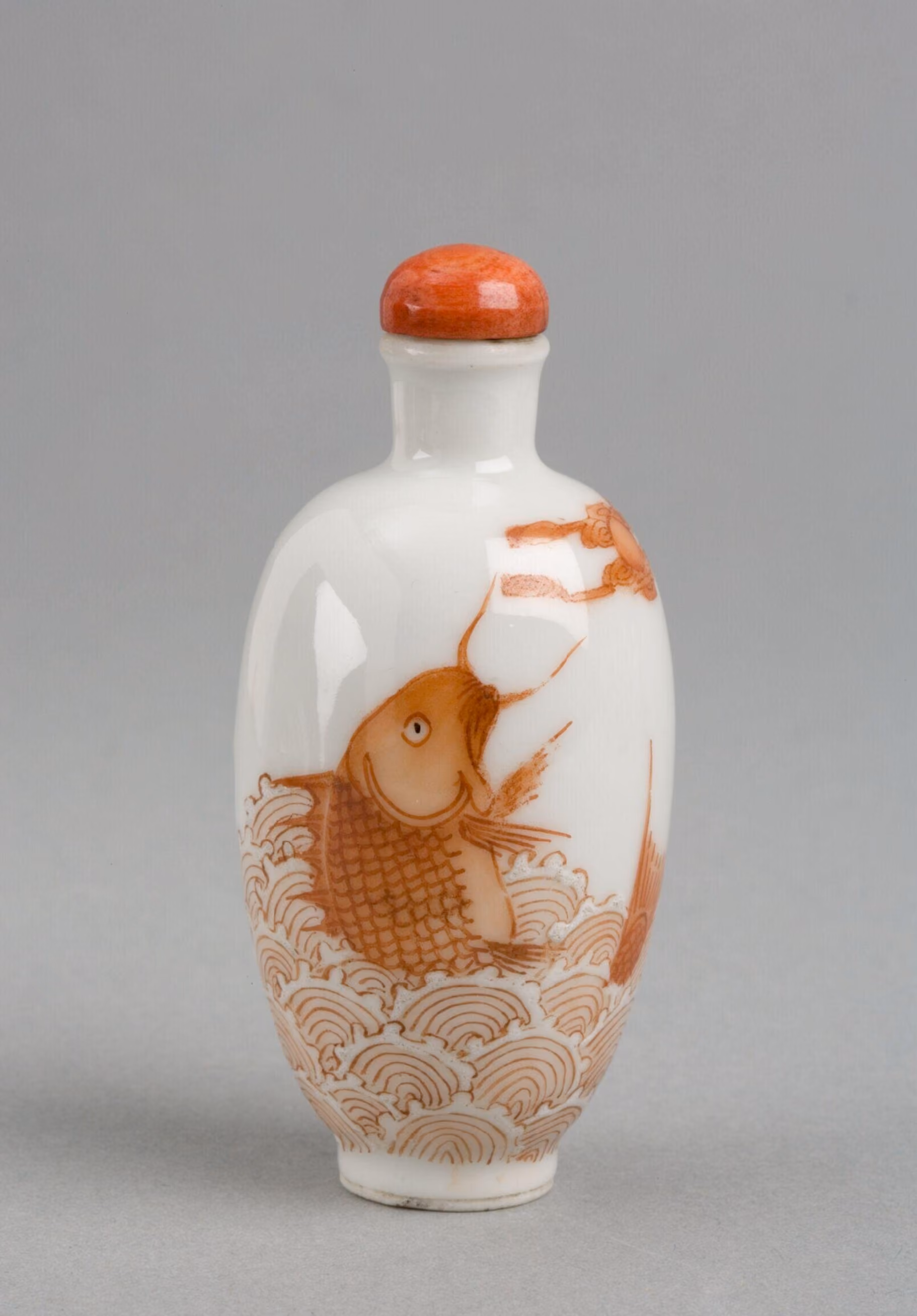 Porcelain with catfish in waves and moon